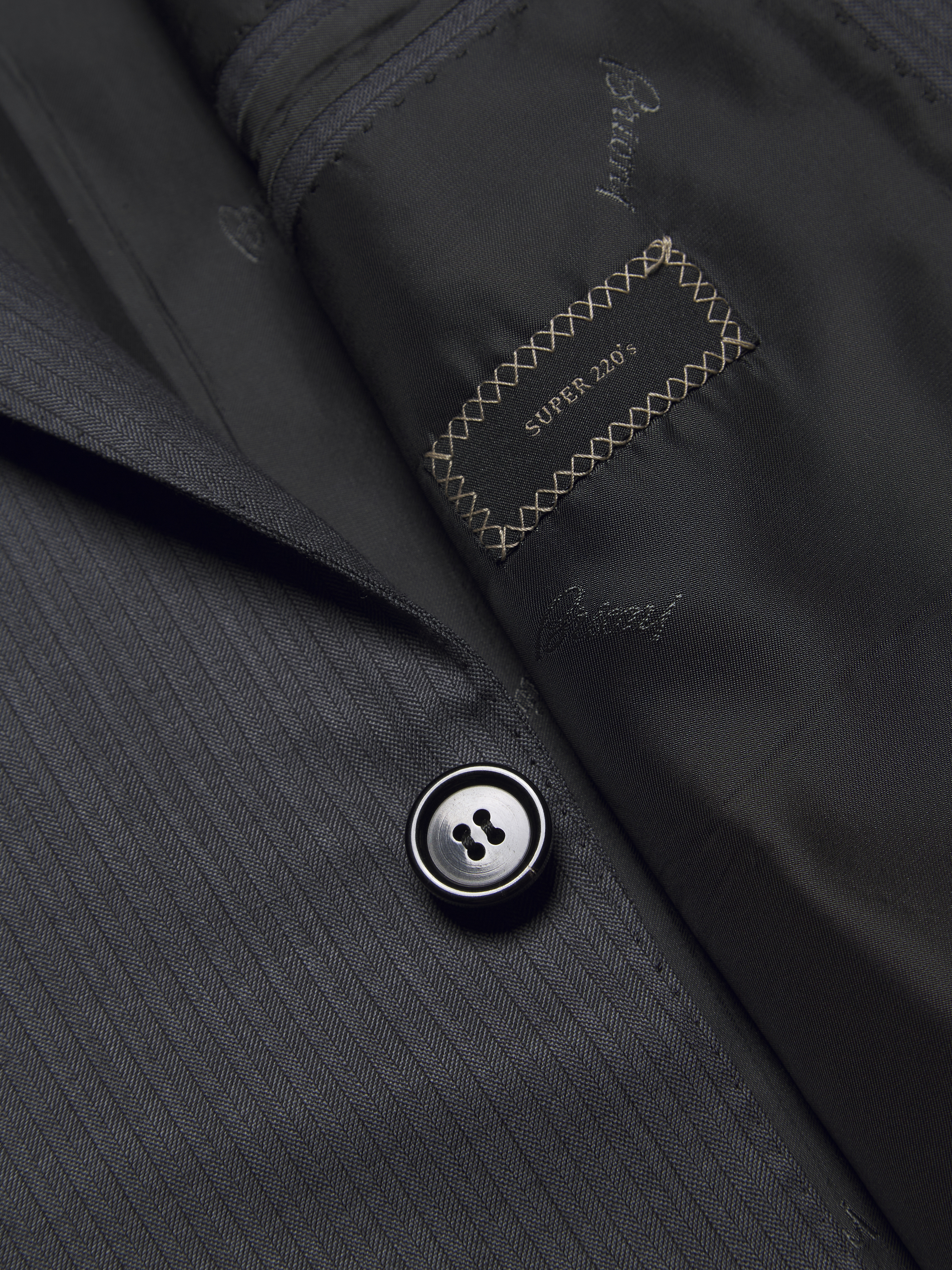 Charcoal grey pinstriped Utopia Super 220's wool Brunico suit