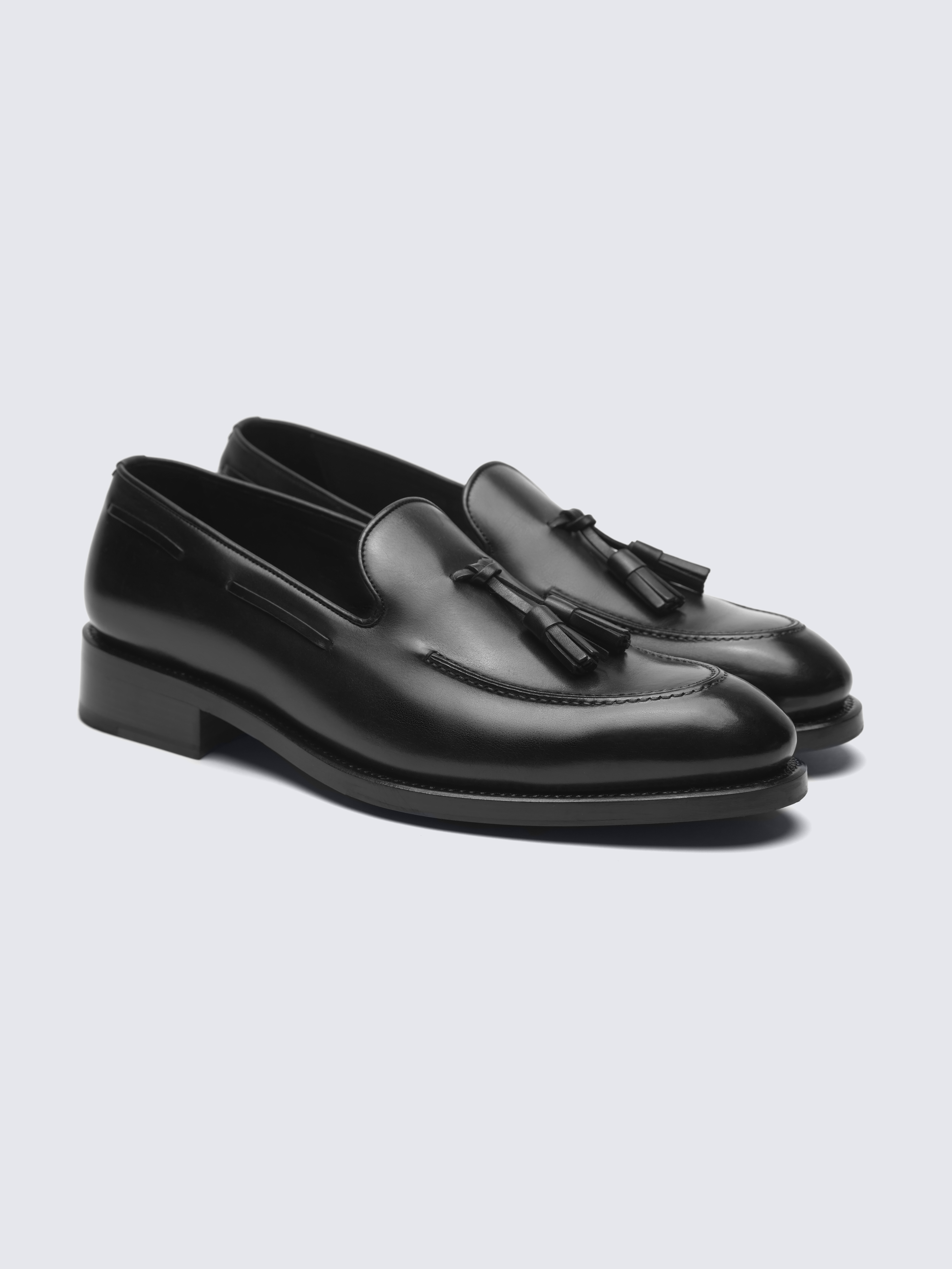 black leather tassel loafers