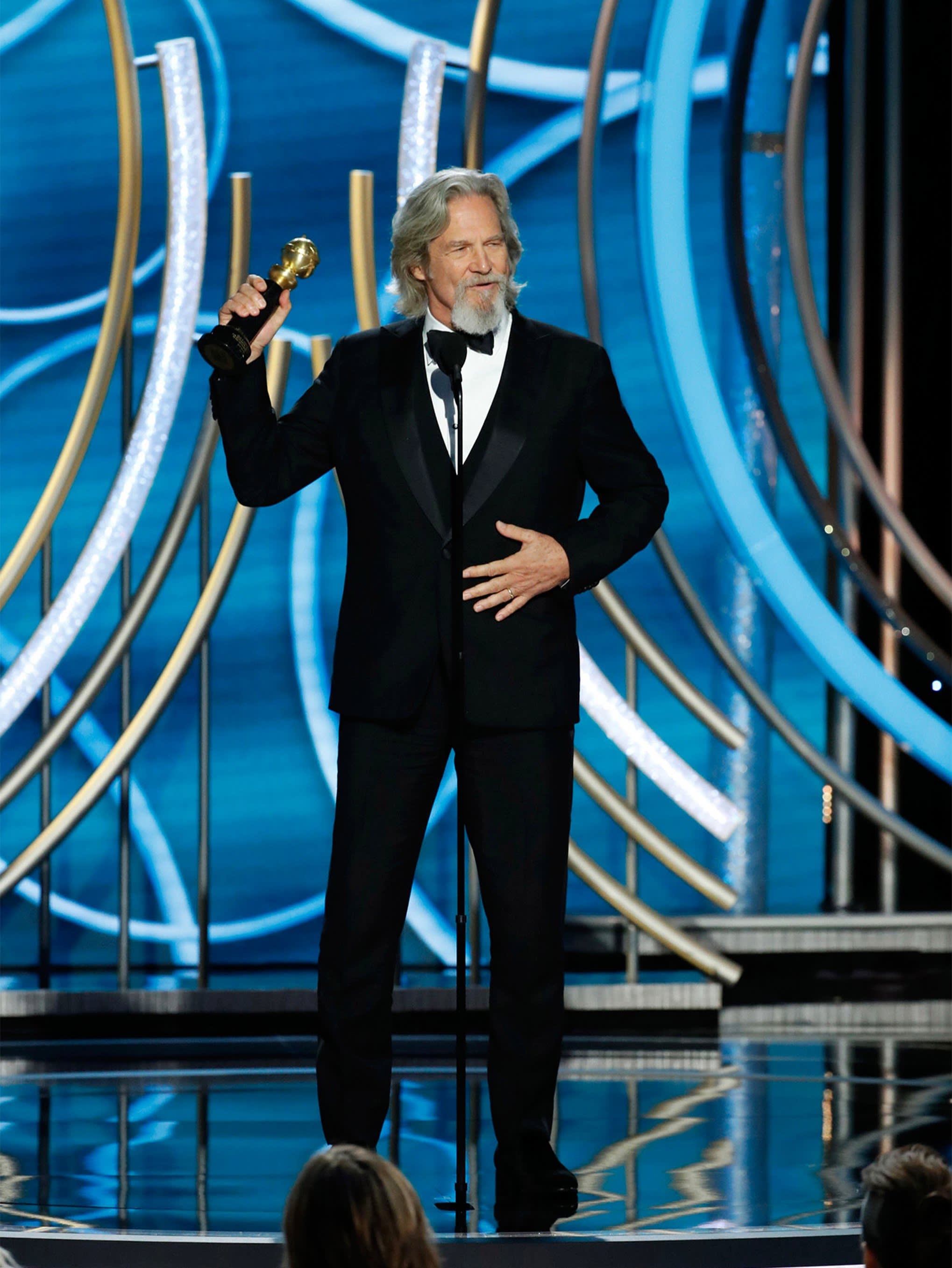 Jeff Bridges wearing a Brioni bespoke black three-piece tuxedo