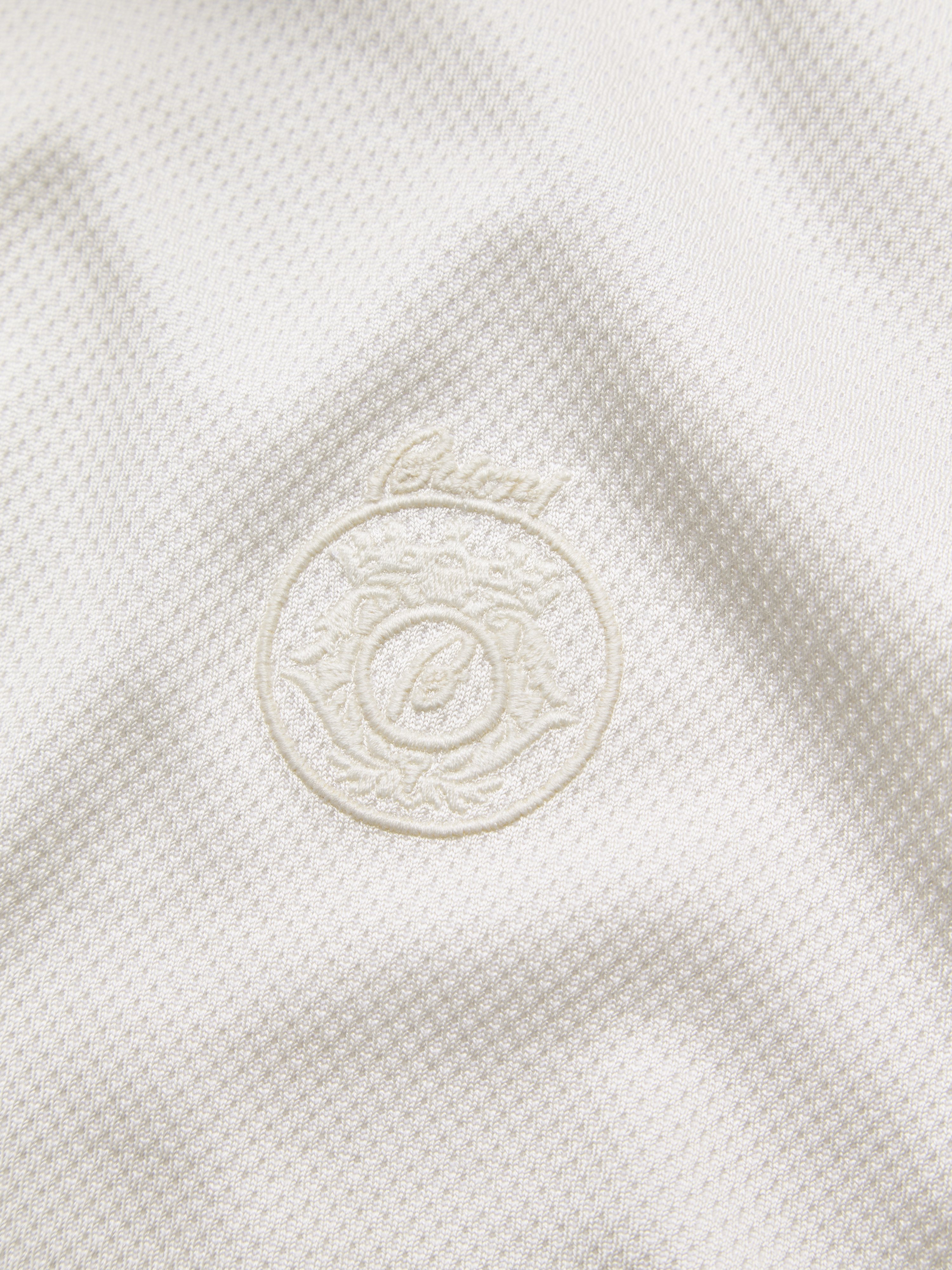 Ivory white silk and cotton jersey half-zip mockneck sweater