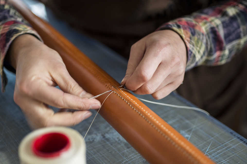Stitching a leather handrail. Credit: Bill Amberg Studio