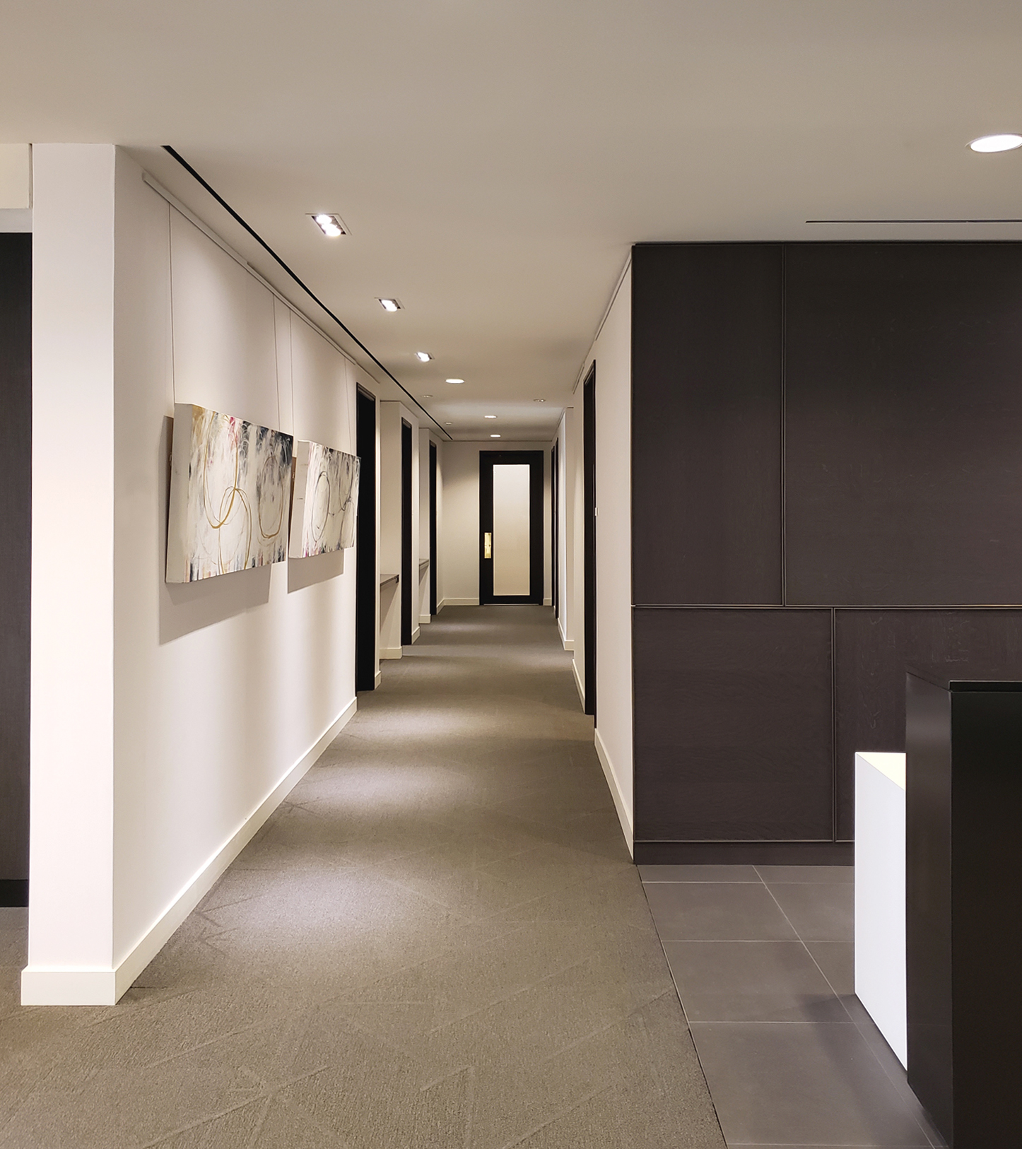 The workspace has numerous niches where art pieces are displayed to create an element of delight and surprise