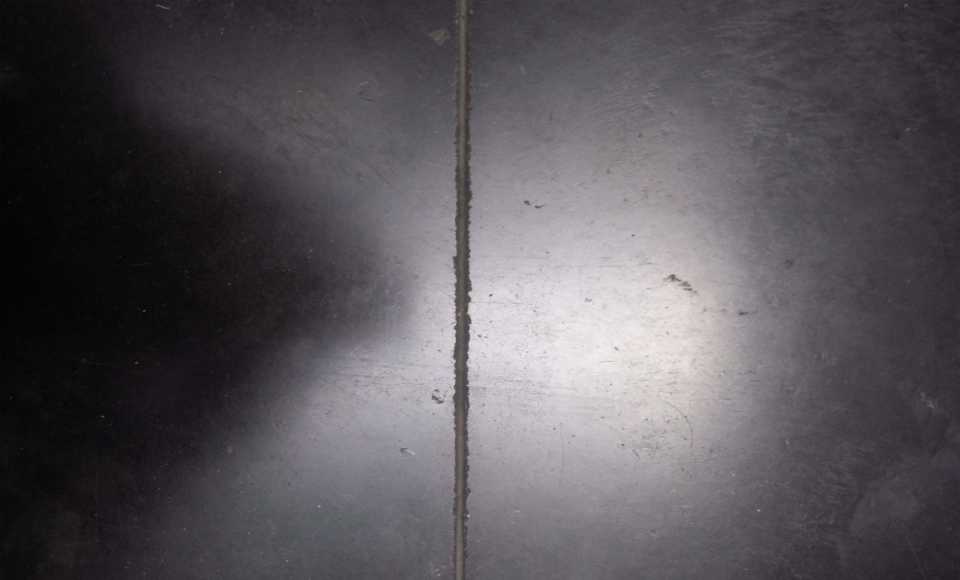 The blackened concrete floor in situ