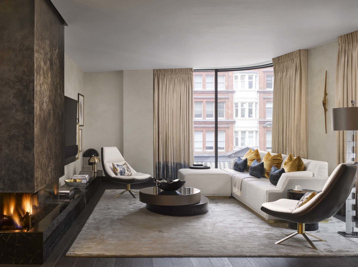 The apartments are flooded with light from floor to ceiling windows, while a centrepiece feature fireplace provides warmth and energy to the living spaces