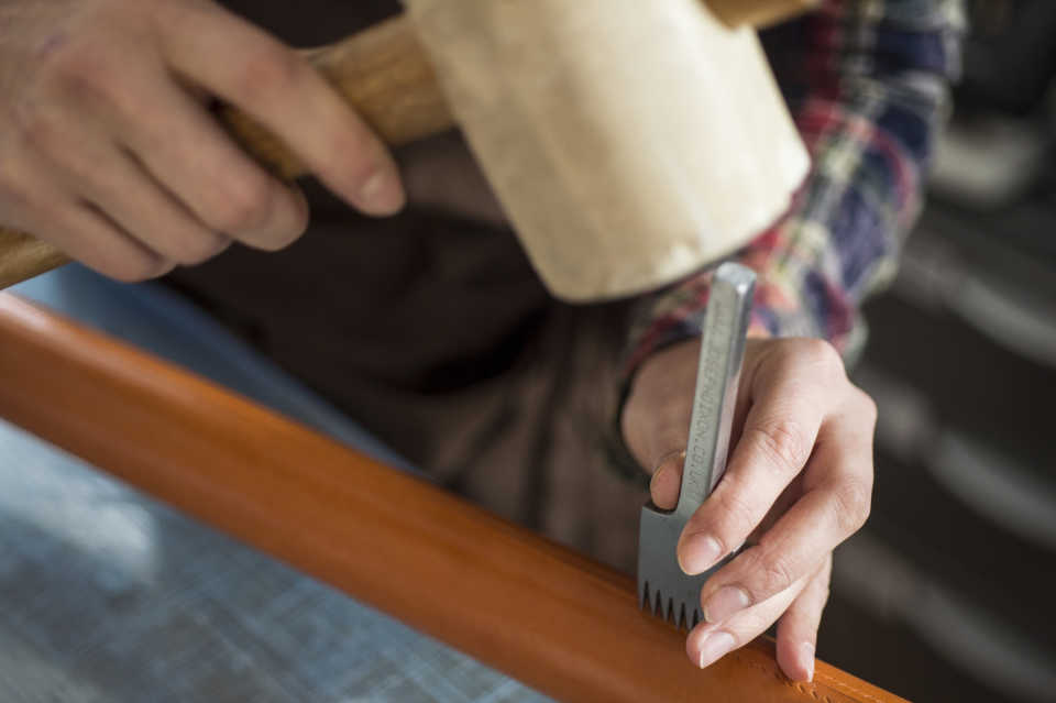 Punching holes for stitching through the leather