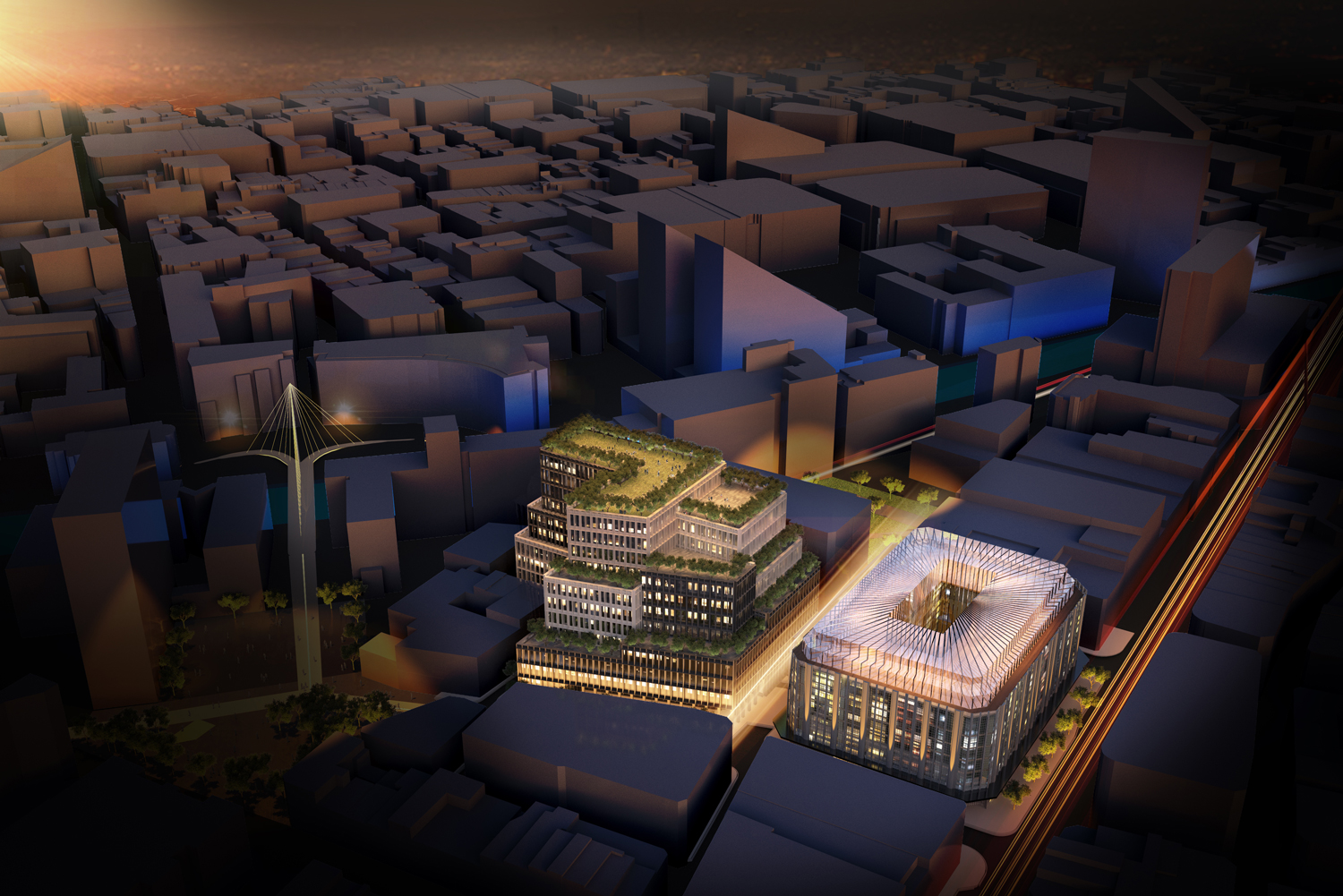 The revived Kendals Building (right0 and new office building (left) together create the beginnings of a new cultural quarter for Manchester