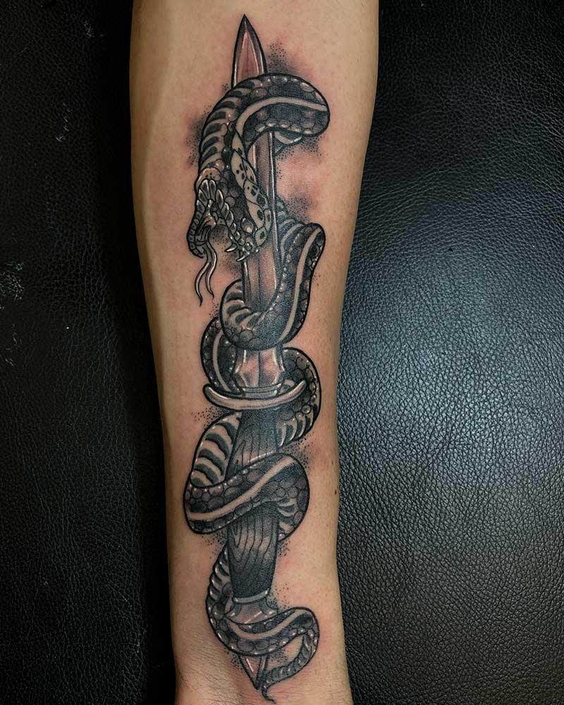 Neo Traditional Snake and dagger tattoo 