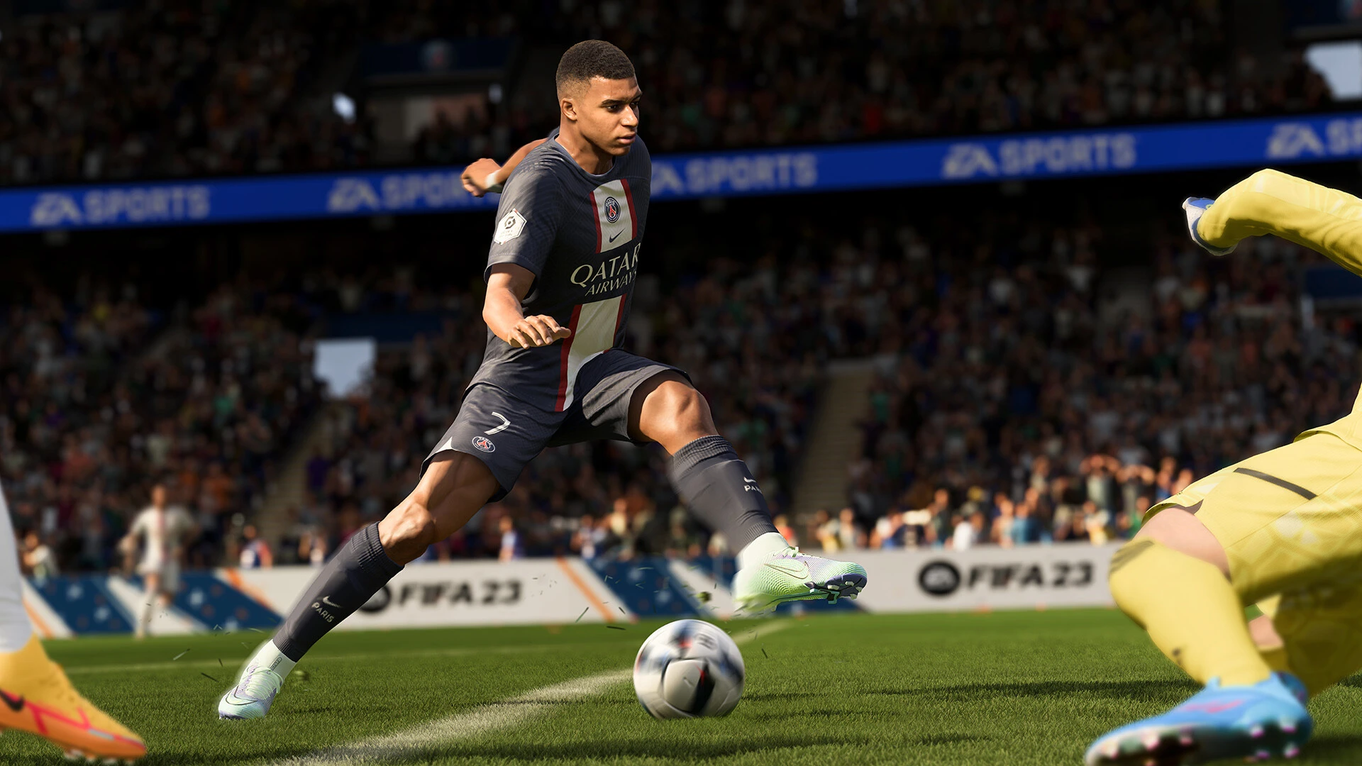 In-game FIFA 23 footage showing Mbappé player dribbling a goalkeeper.