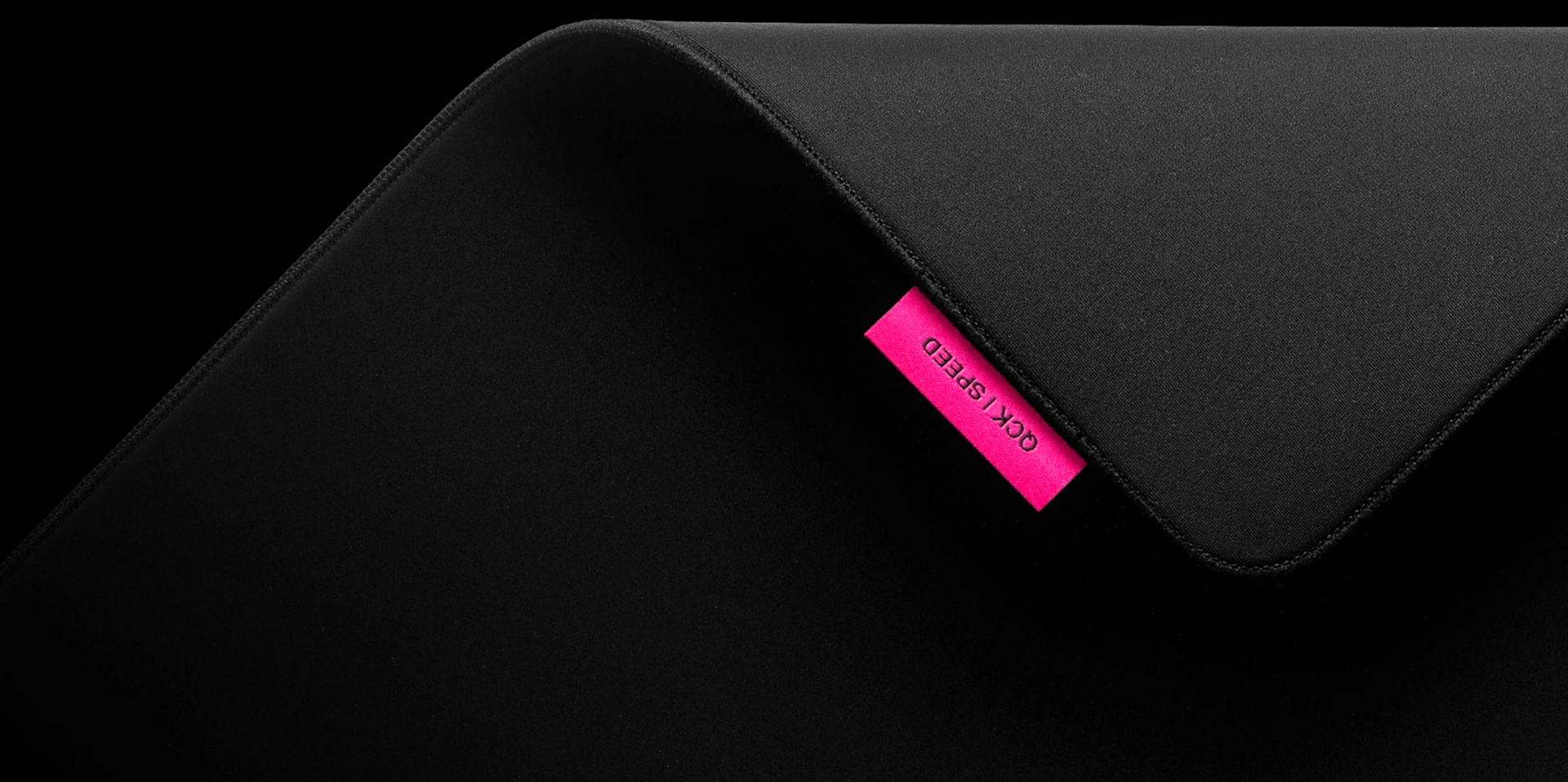 photo showing mouse pad and tag attached