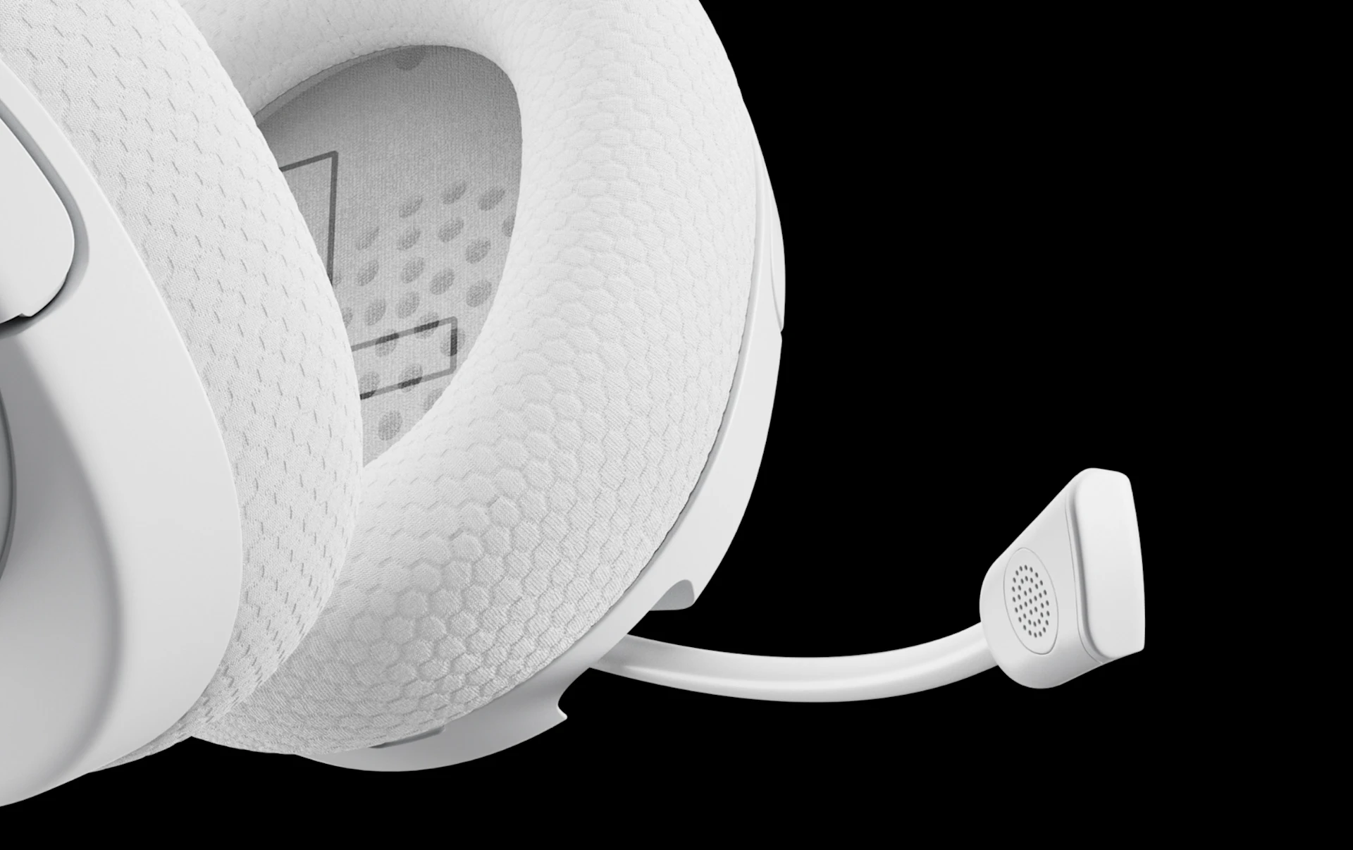 A close-up of a black gaming headset's textured earcup and flexible boom microphone, highlighting the honeycomb-patterned fabric against a solid black background.