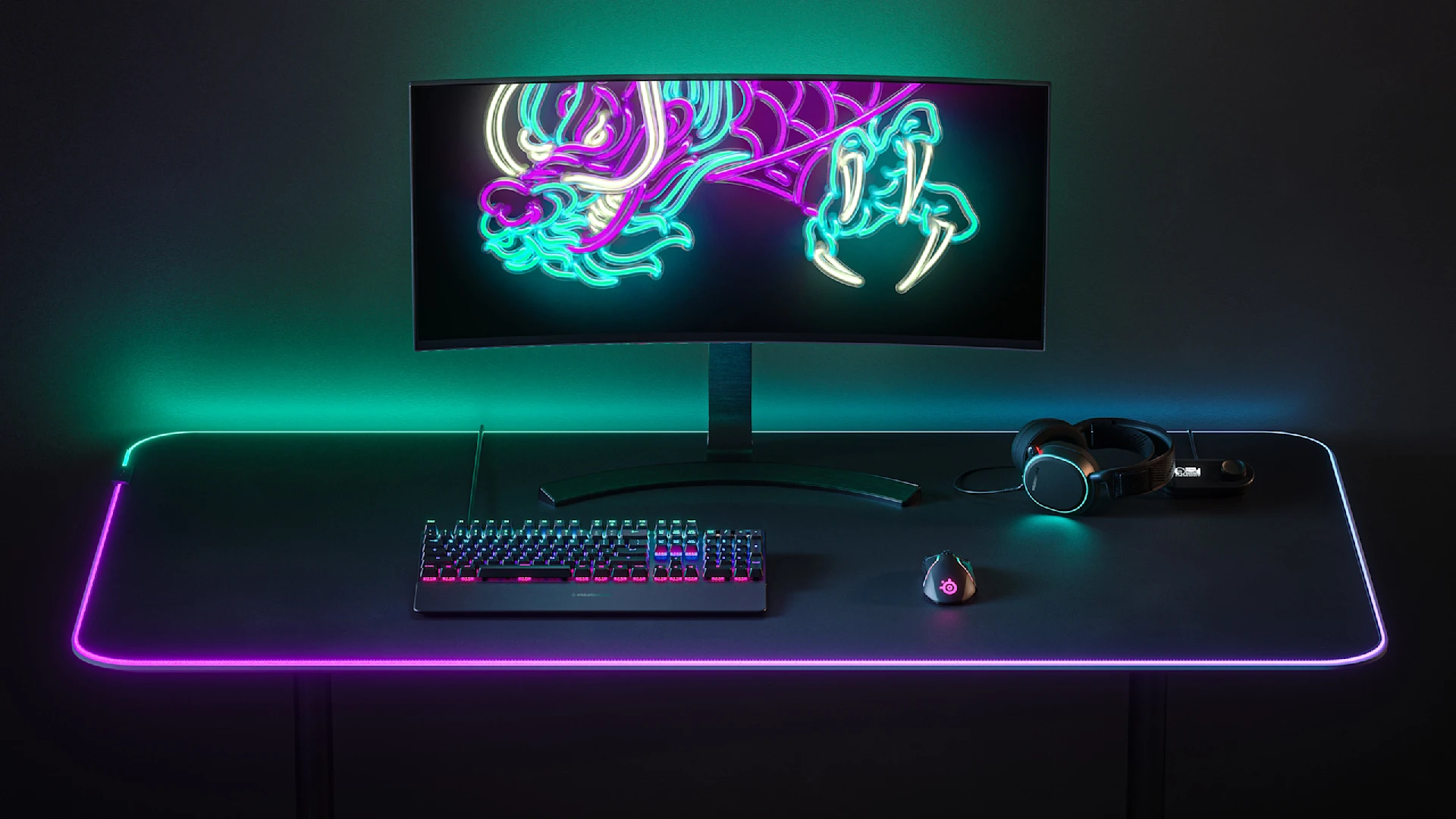 SteelSeries gaming setup illuminated with RGB colors.