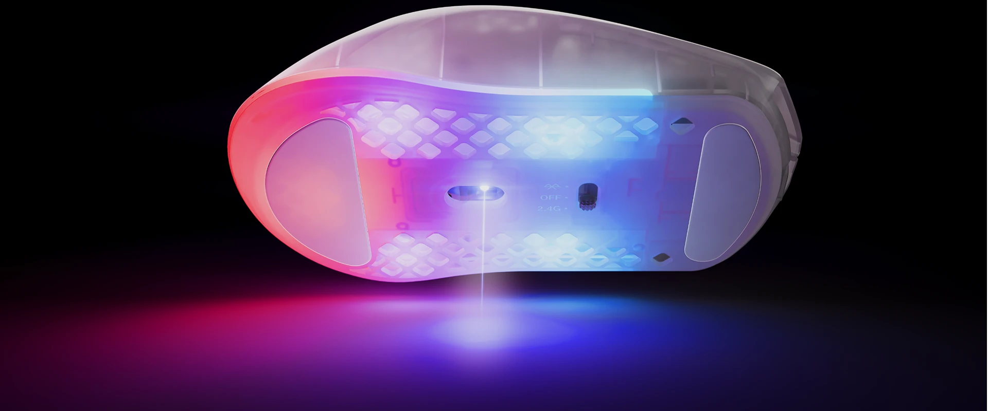 Bottom of RGB mouse emitting laser beam onto surface in pink and blue lighting.