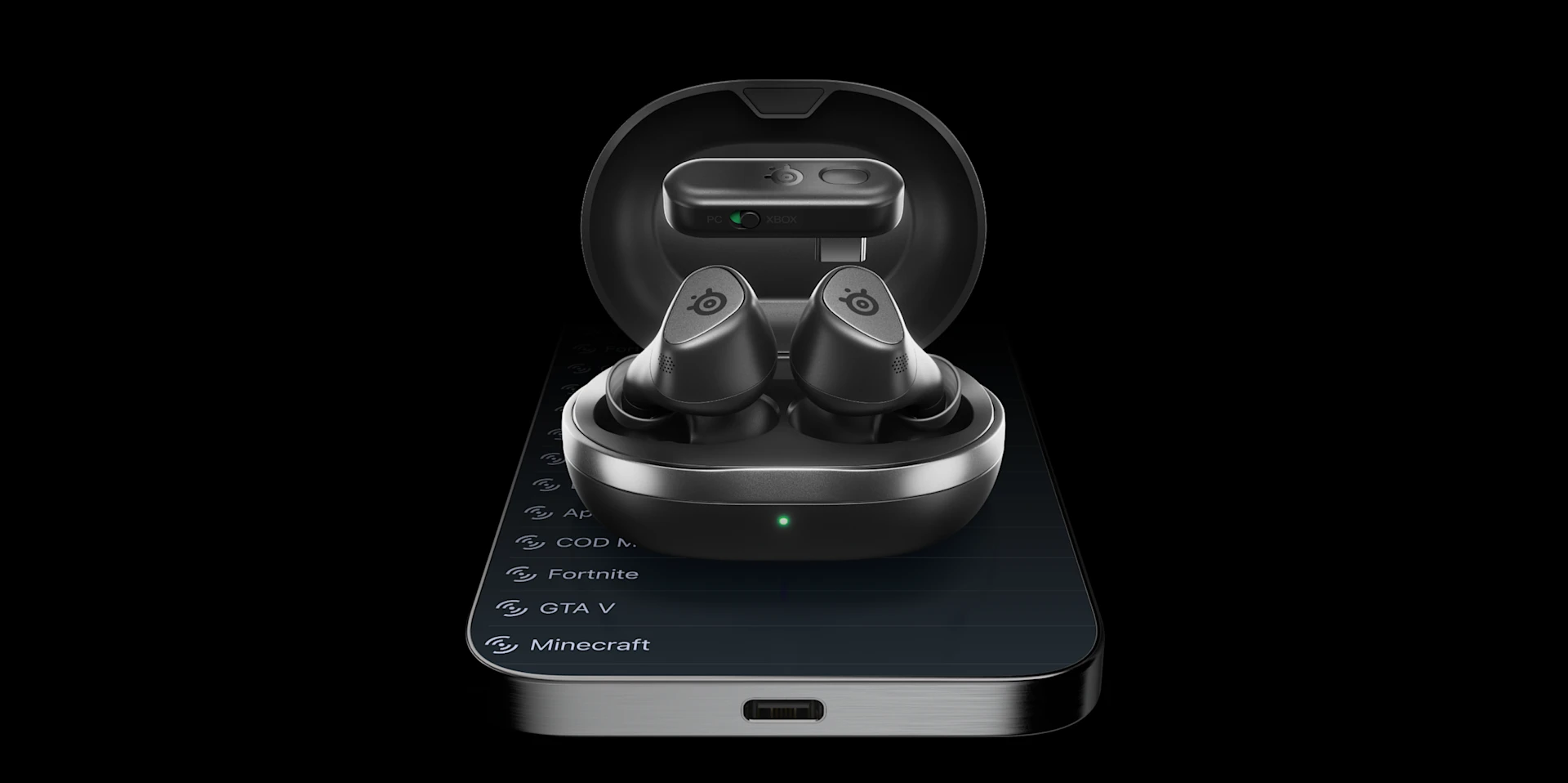 View of the black Arctis Gamebuds headphones lying in a black charging case; the dongle is hovering slightly above the headphones; everything is set against a black mobile obe with Arctis companion app running.