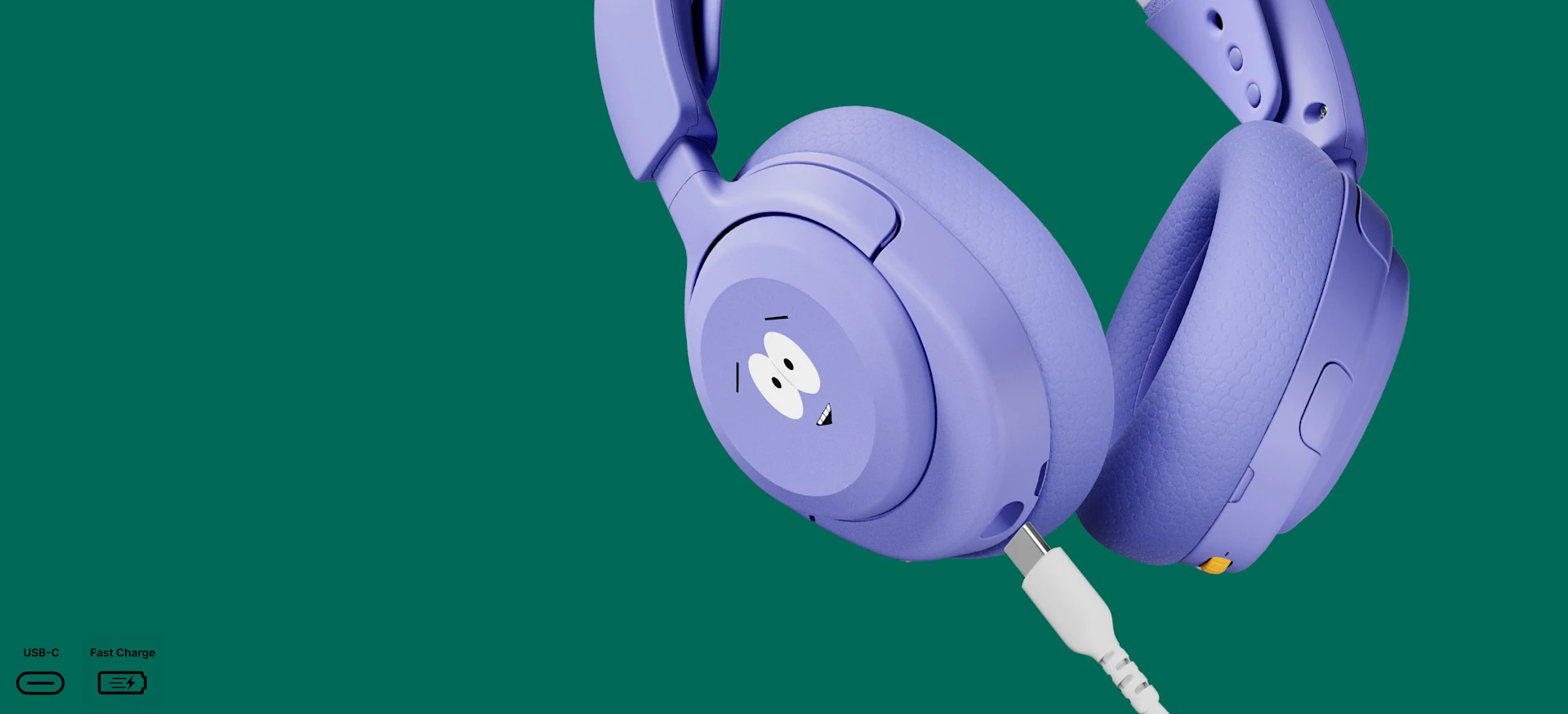 Close-up of the SteelSeries Arctis Nova 5 Wireless South Park edition gaming headset in purple, showing a Towelie on the ear cup with a white USB-C fast charging cable connected against a green background.