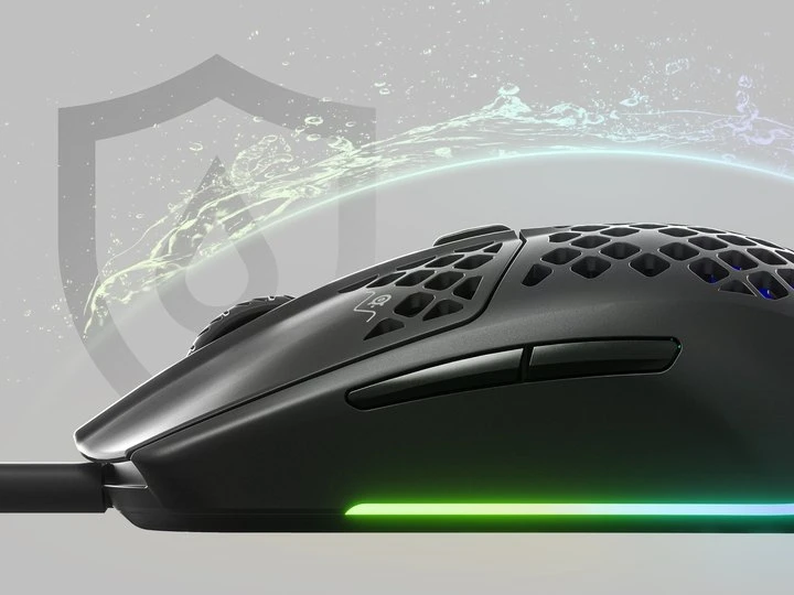 An Aerox 3 mouse with an invisible shield protecting it from incoming water splashing, to convey the waterproofing features.