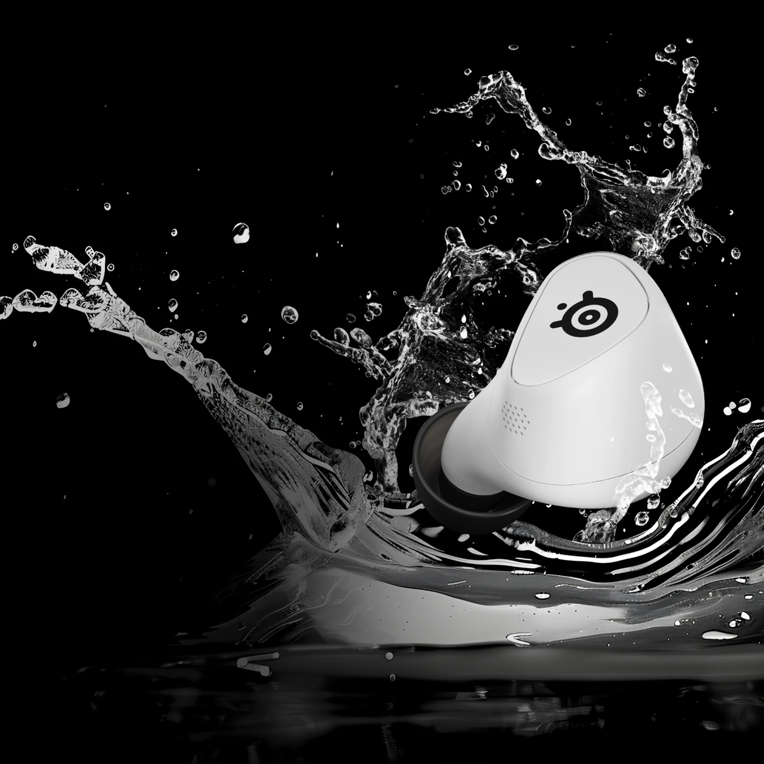 A single whie Arctis Gamebuds earbud falling into the water, creating a large splash.