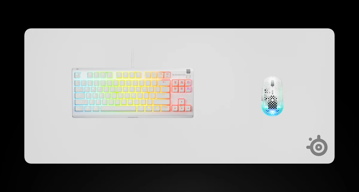 SteelSeries QcK Heavy XXL White mouse pad with a keyboard and mouse