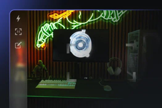 A digital interface overlaying a gaming setup. A central framing square focuses on a circular light on a monitor, while a sidebar on the left features icons for flash, aspect ratio, and editing.