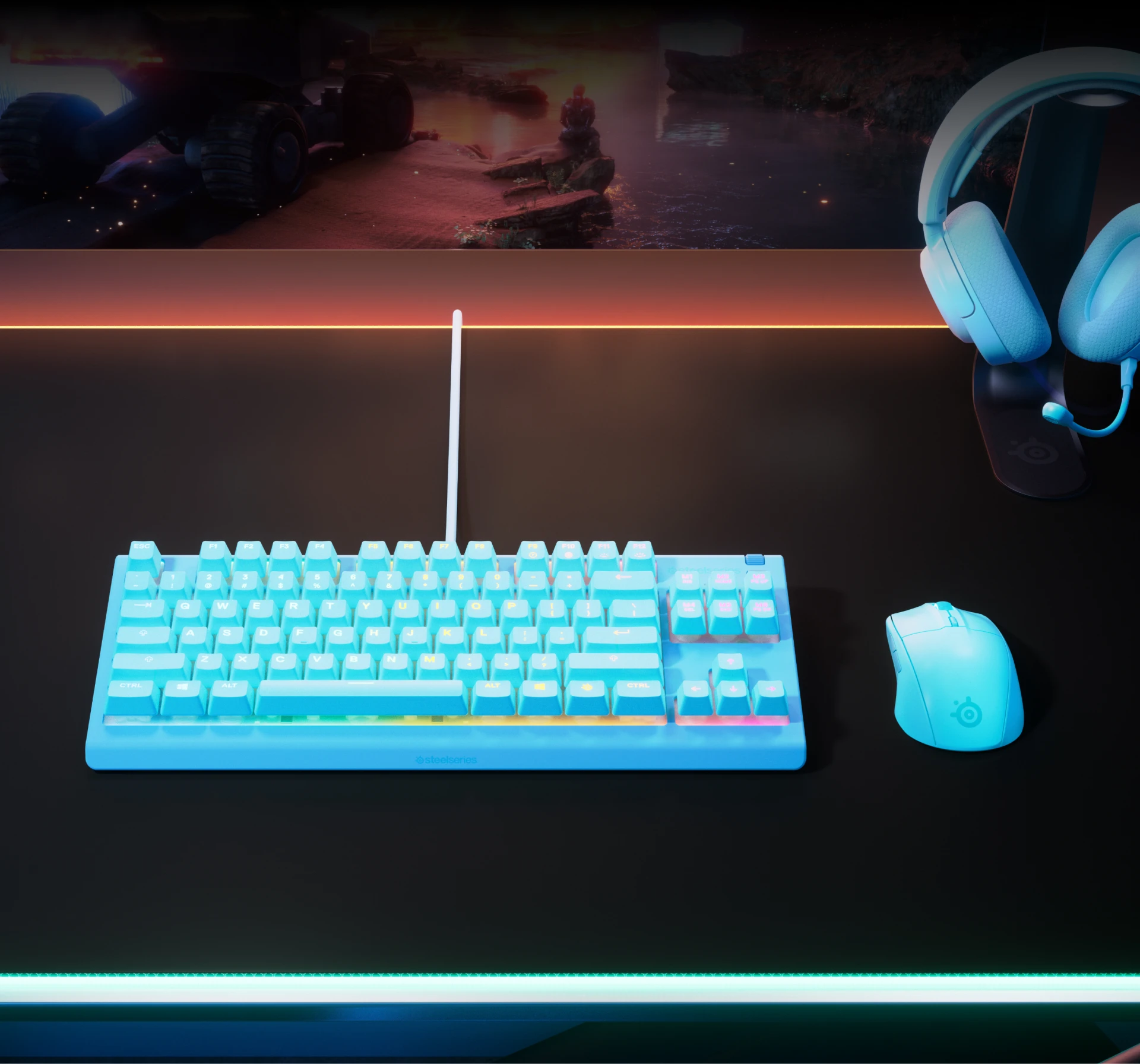 Apex 3 TKL keyboard on a desk together with gaming mouse