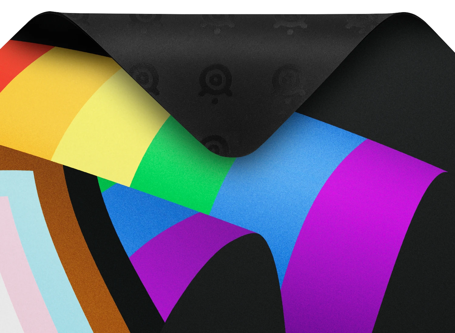 SteelSeries QcK Large Pride Edition gaming mousepad featuring a progress pride flag design and high-thread-count cloth surface.
