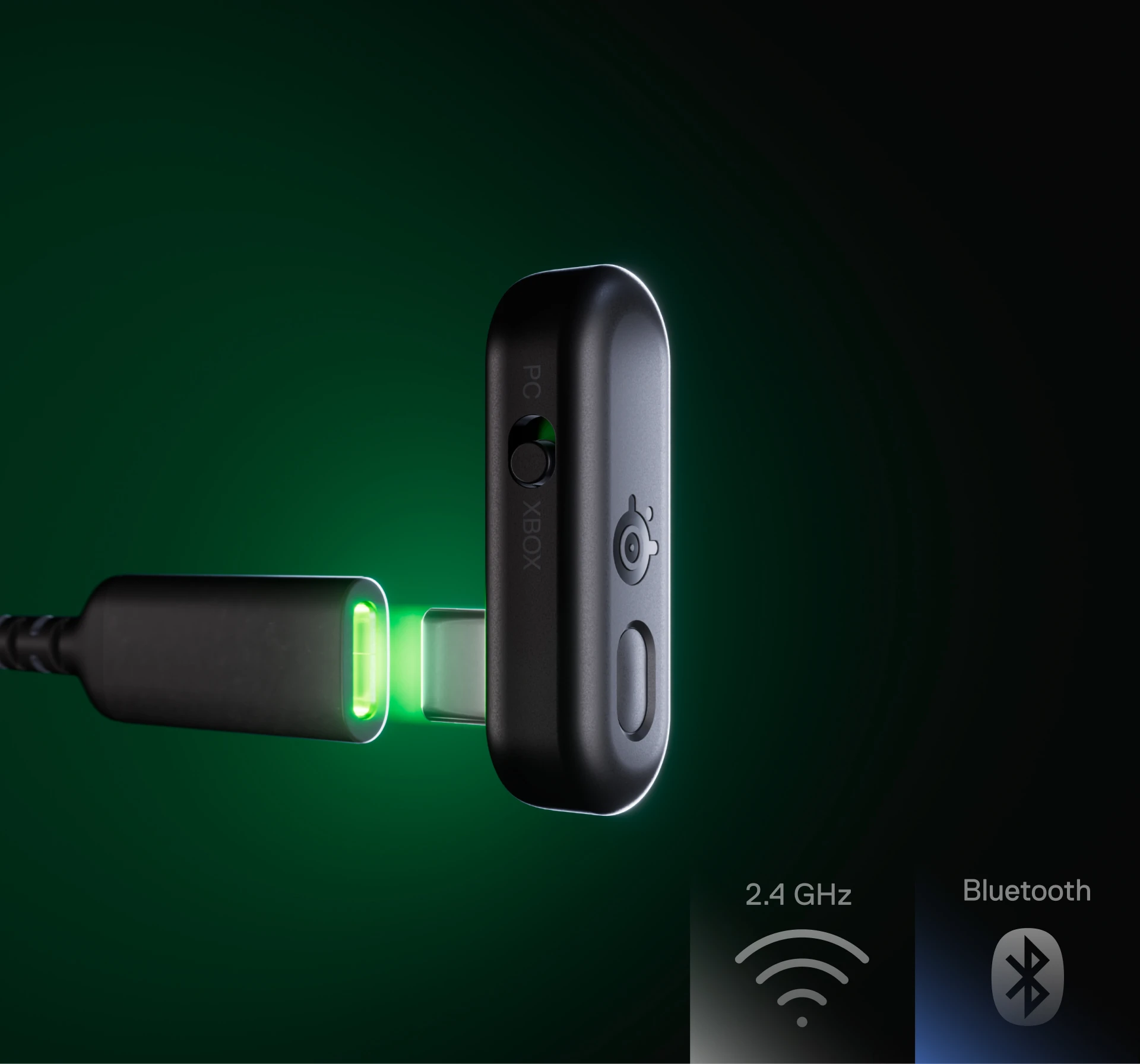 The Arctis Gamebuds dongle slowly reaches the USB-C port; the space between them lights up green.