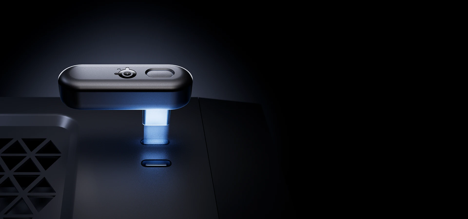SteelSeries USB-C wireless dongle for Arctis Nova 3 Wireless, shown plugged into a PC port with a blue glow to highlight easy plug-and-play multi-platform setup.