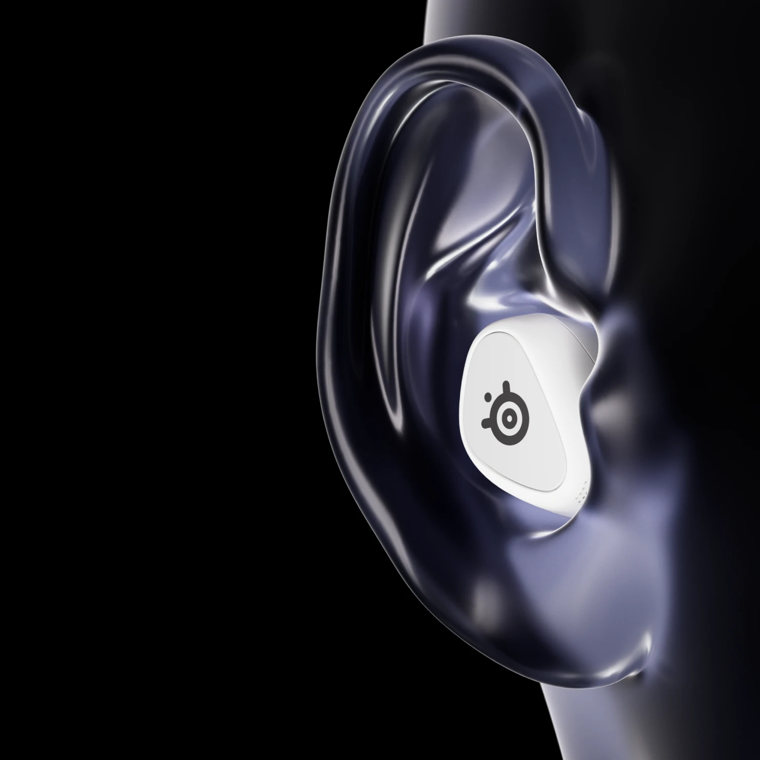 Visible large ear of the mannequin with a white Arctis Gamebuds headset.