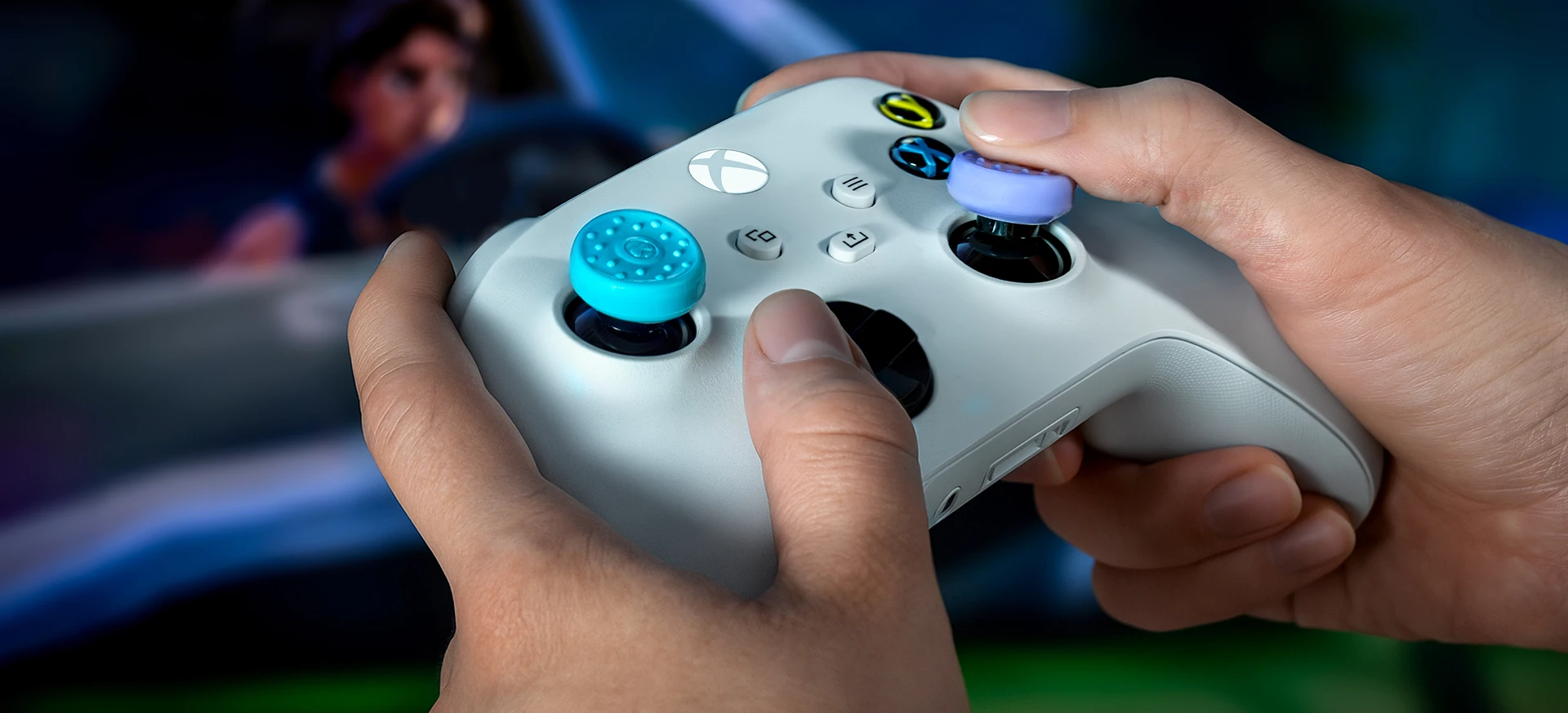 Close-up view of a thumbs moving the thumbsticks.