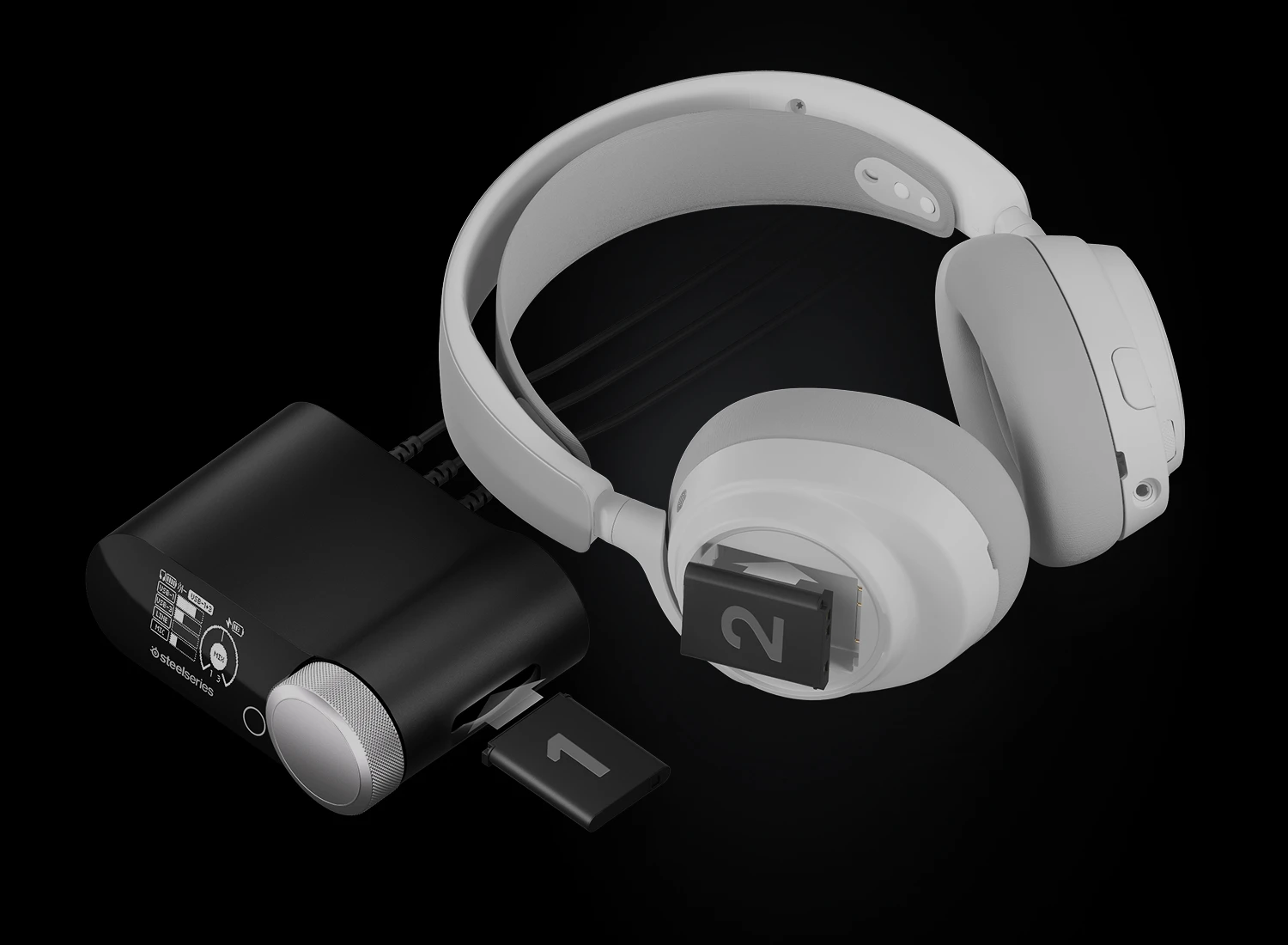 White Arctis Nova Pro Wireless headset lying beside its base station, with two hot-swappable batteries labeled 1 and 2.