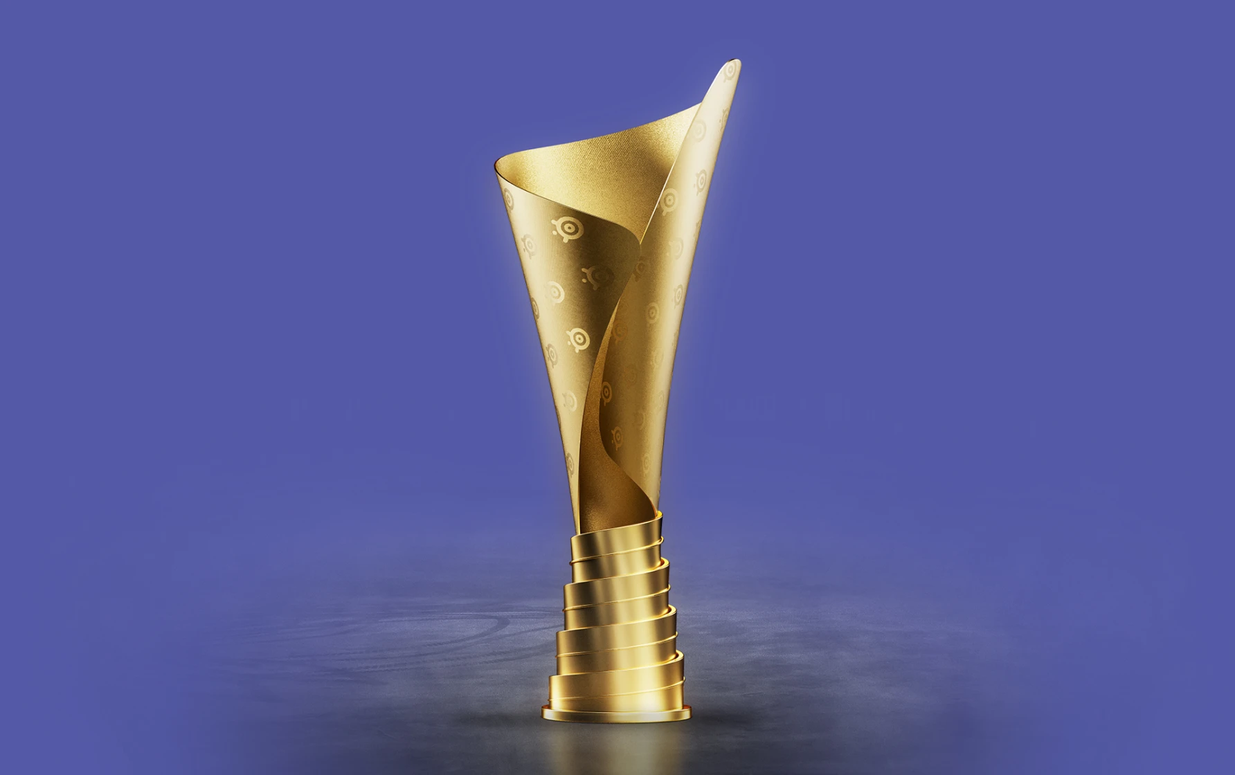 A tall, sleek gold trophy styled to look like a rolled-up SteelSeries gaming mousepad, featuring a subtle repeating logo pattern on the metallic surface against a deep purple background