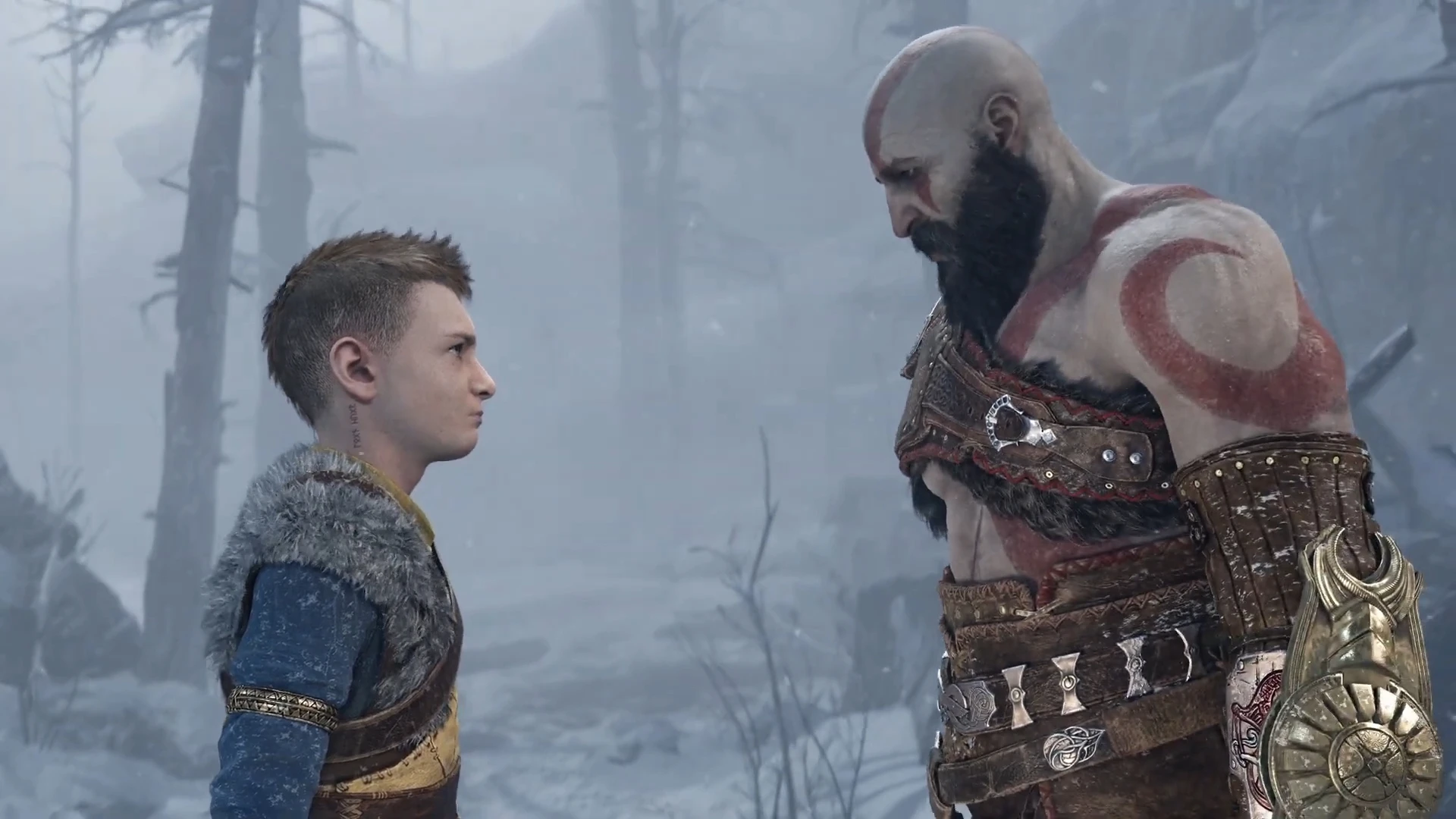 In-game footage of Kratos, the main character of God of War, and a child, staring each other.