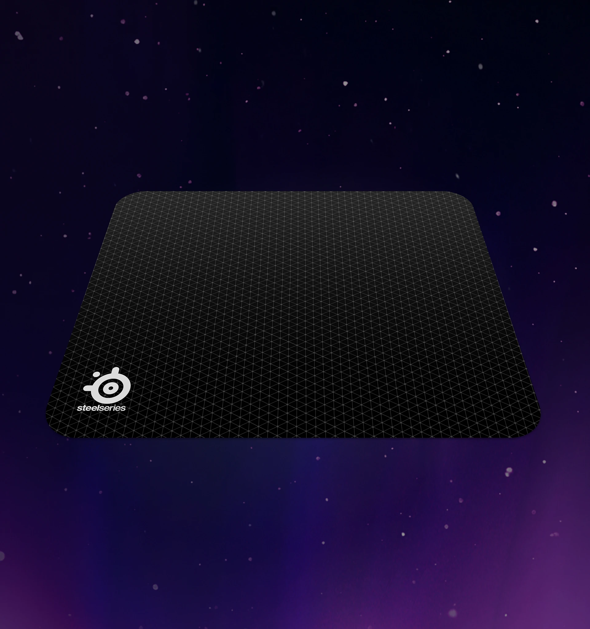 QCK M mousepad on a purple background