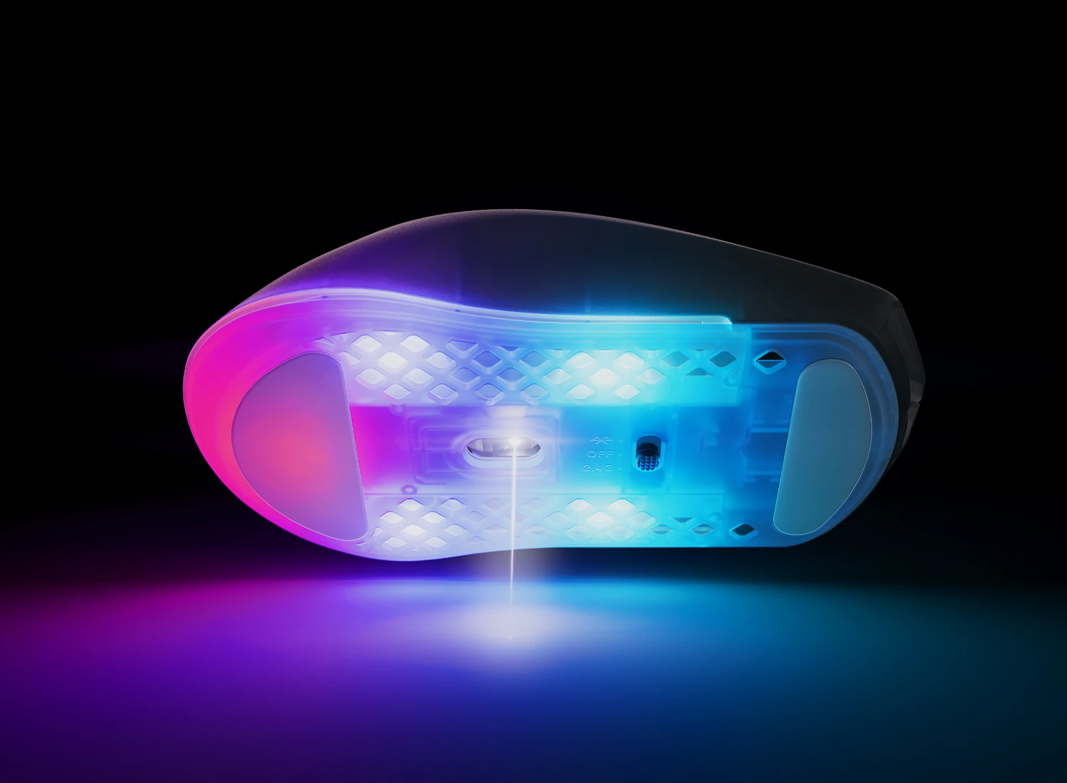 Bottom of RGB mouse emitting laser beam onto surface in pink and blue lighting.