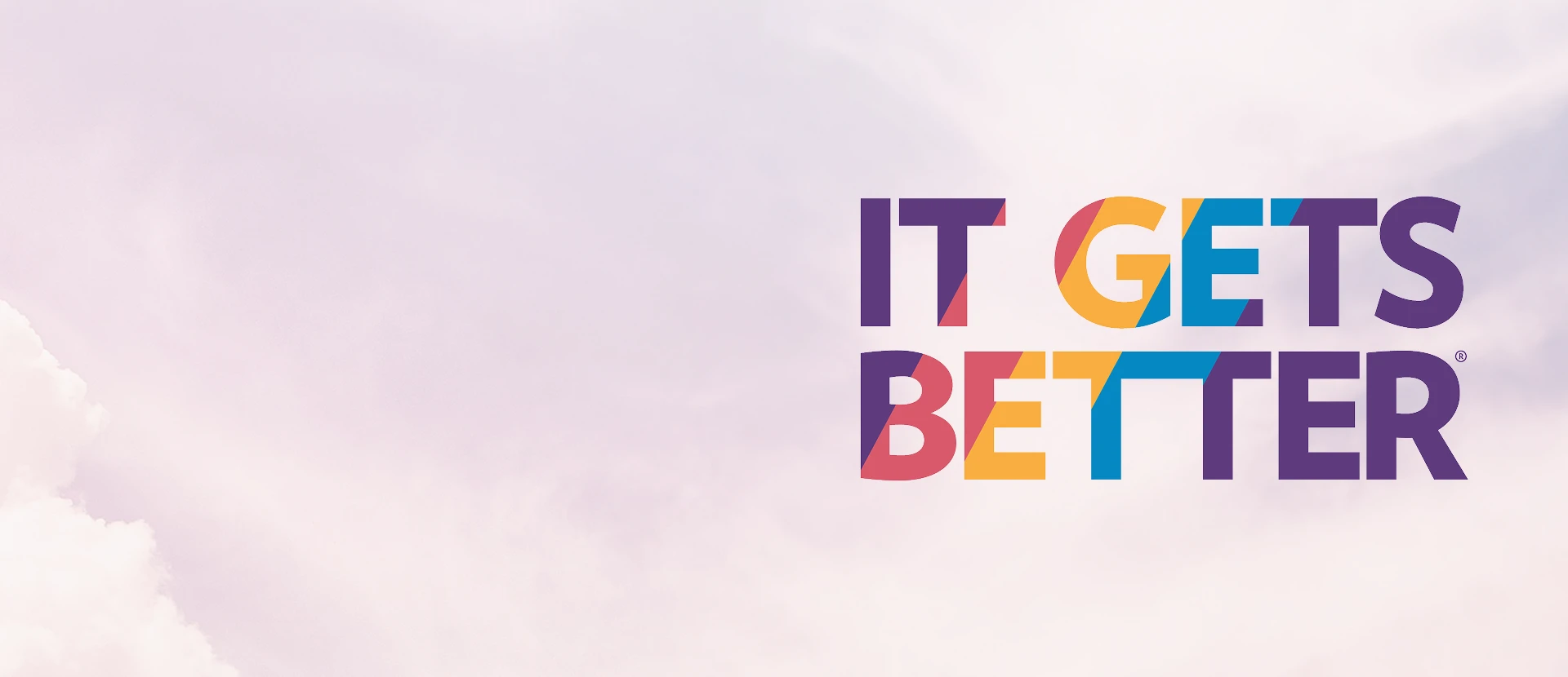 The "It Gets Better" Project logo in colorful lettering set against a soft pink sky background, highlighting the SteelSeries Pride 2026 charity partnership.