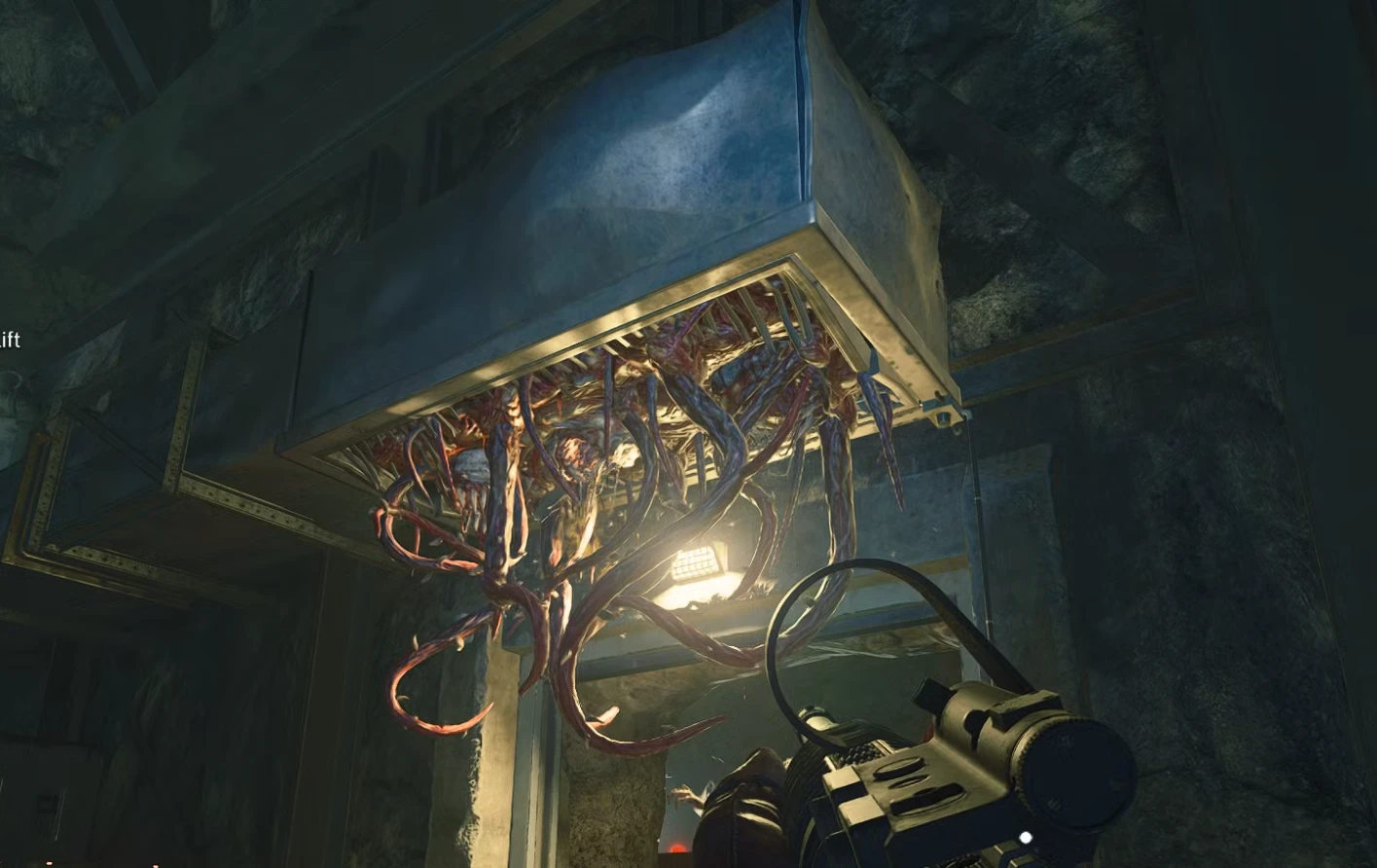 Octopus tentacles hanging from a ventilation box in a damp room.
