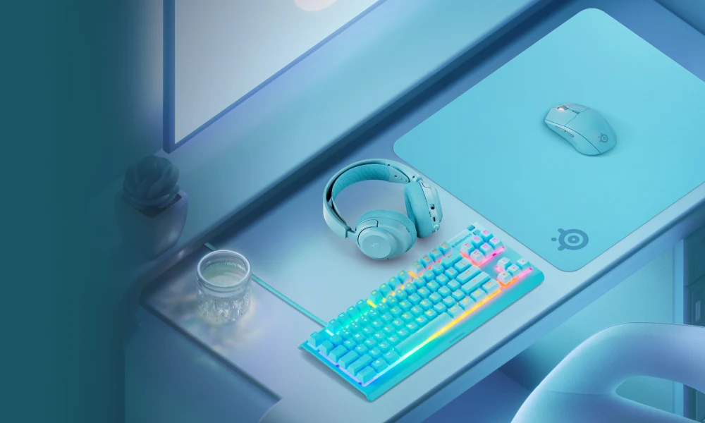 An image of an all aqua SteelSeries gaming setup.