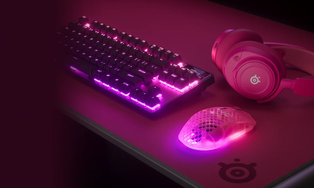 An image of an all magenta SteelSeries gaming setup.