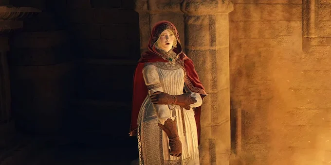 Medieval woman standing near the wall.