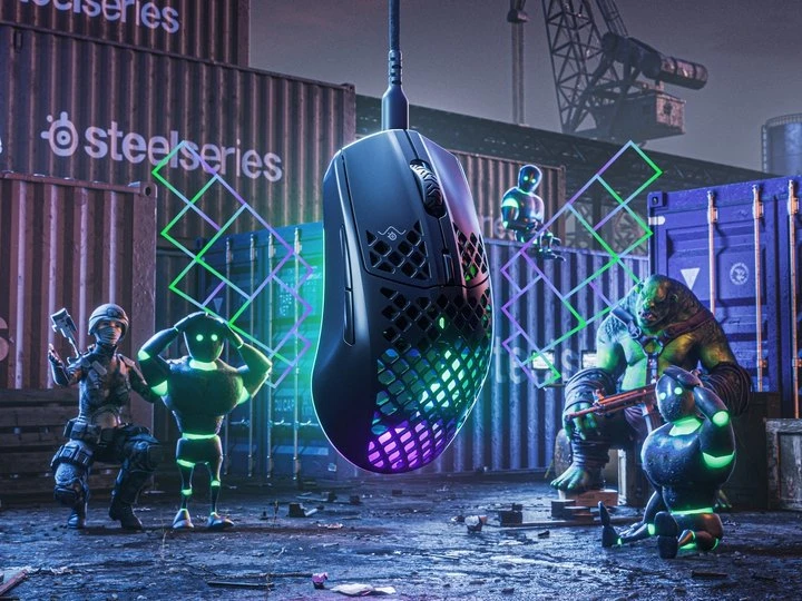 Aerox 3 2022 mouse is floating in a shipyard full of containers that are labeled "SteelSeries".