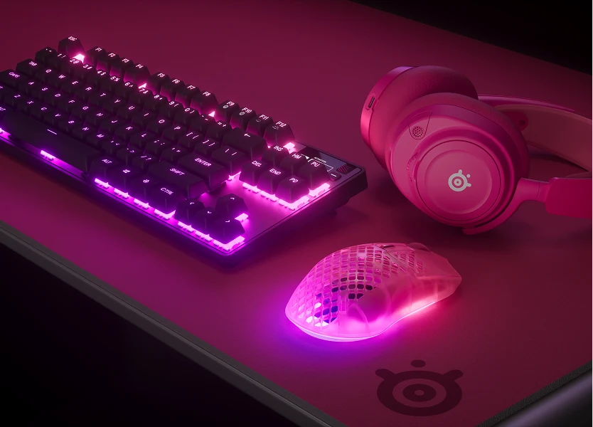 An image of an all magenta SteelSeries gaming setup.