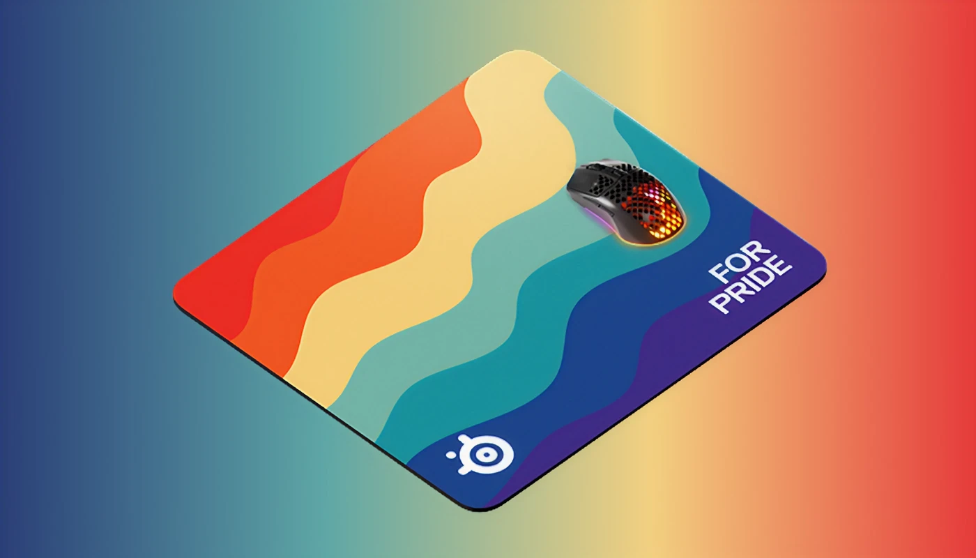 An image of the QcK L - Pride Edition mousepad and an Aerox mouse with a rainbow gradient background.