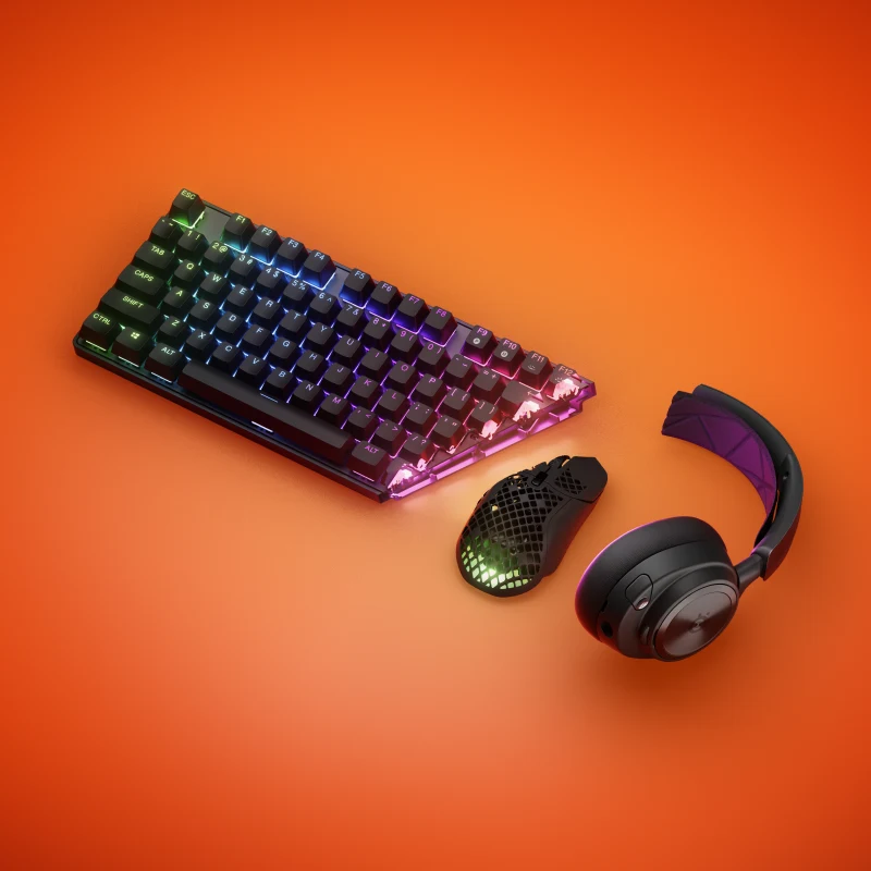 Keyboard, mice and Arctis headsets in an orange background
