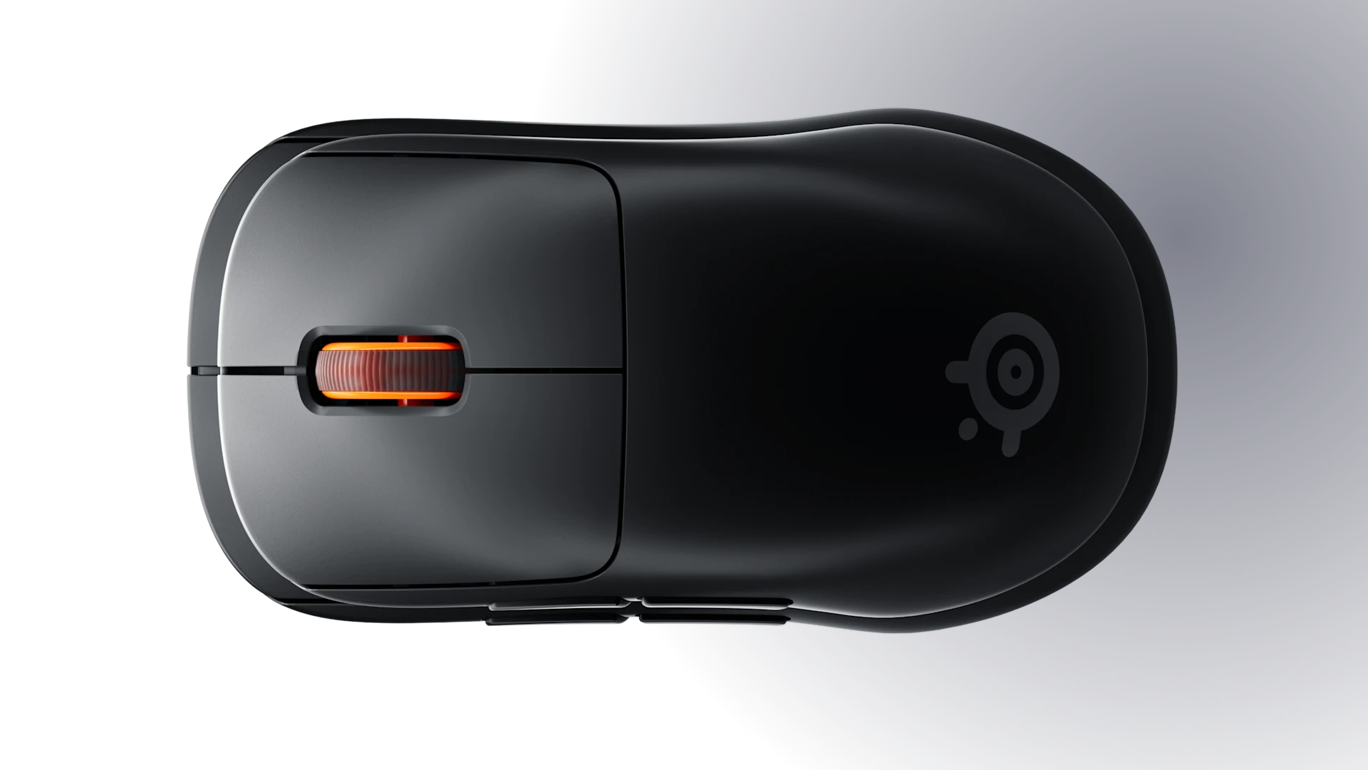 Direct overhead view of the matte black Sensei Pro gaming mouse displaying its symmetrical body shape and orange scroll wheel.