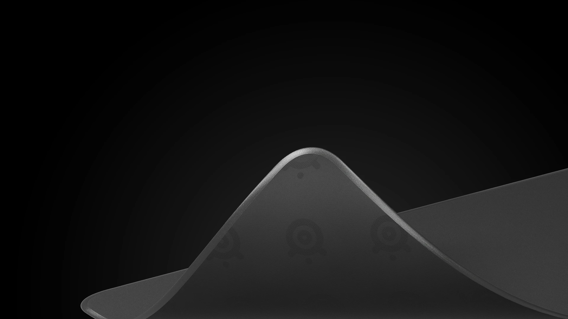 Folded qck edge mousepad;visible steelseries logo on the back of it.