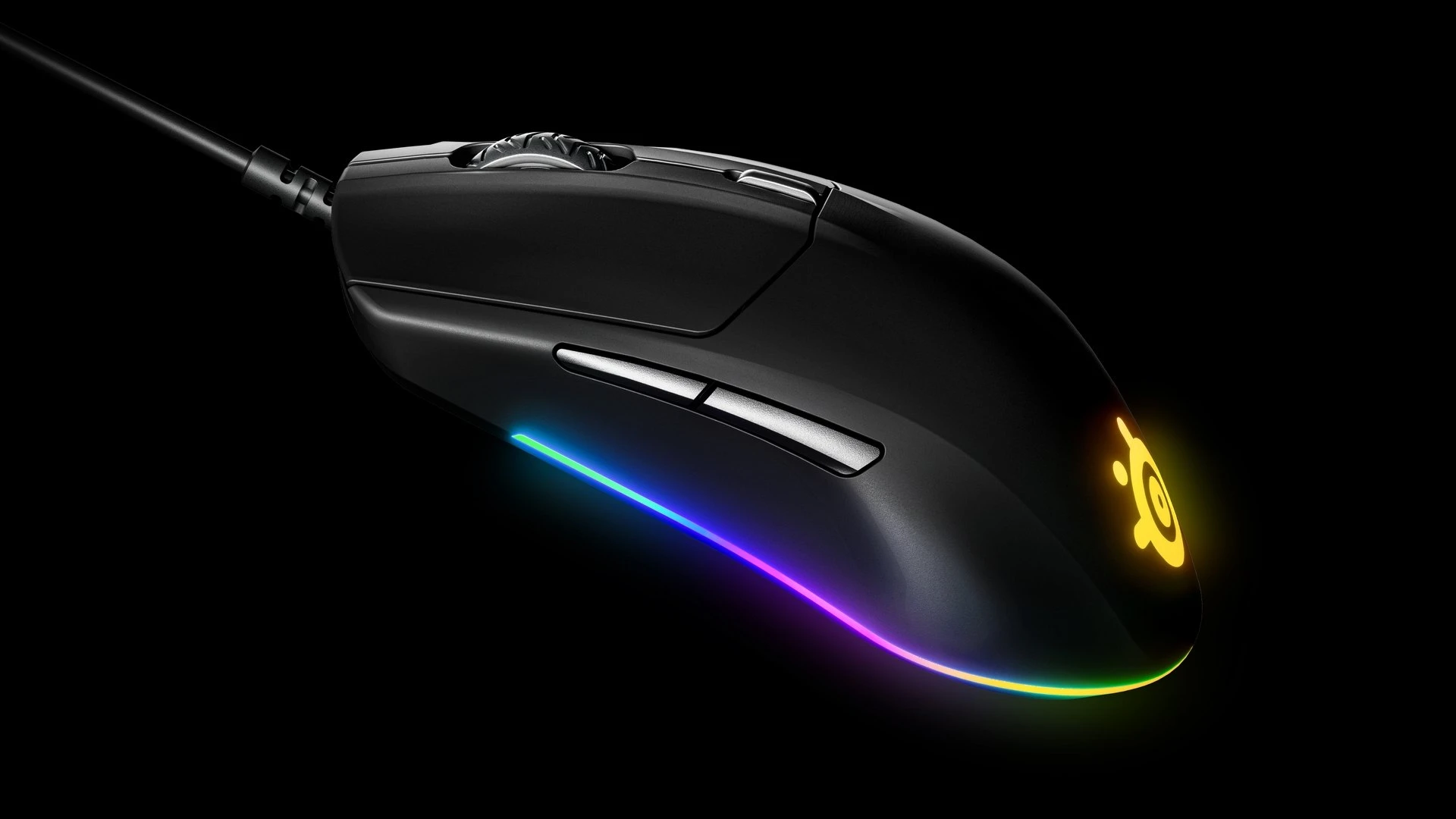 Side view of Rival 3 Wired mice with RGB lightning in front of a dark background.