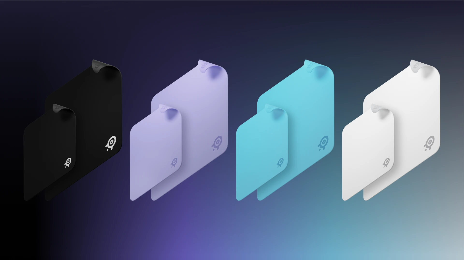 Mousepad QcK in quattro colori diversi su sfondo scuro