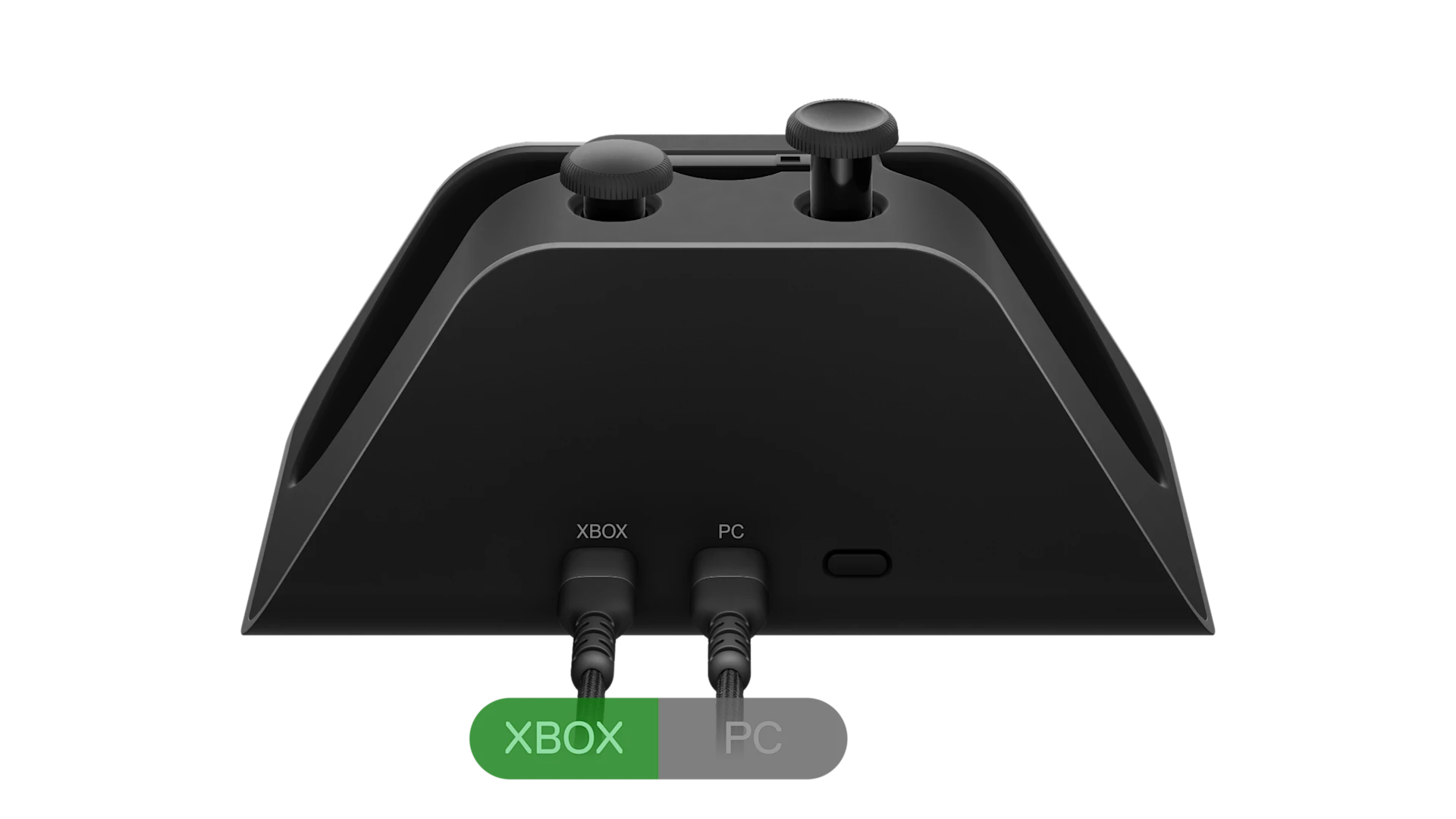 SteelSeries Aeon Pro 充电底座的背面视图，USB 接口分别标注了 Xbox 和 PC 专用。