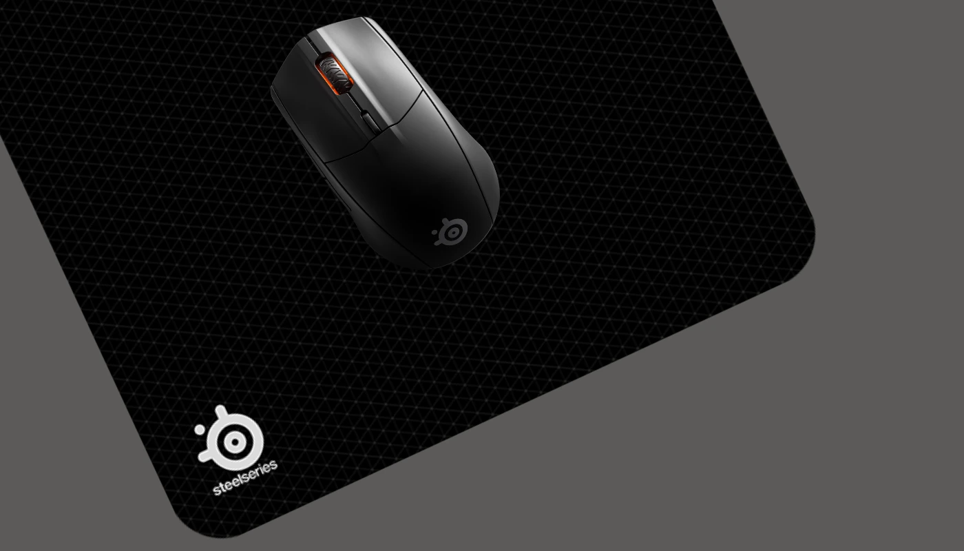 An image of the QcK Vector mousepad and a Rival mouse with a grey background.