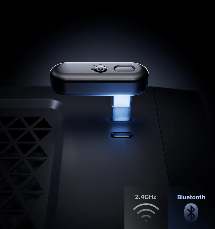 SteelSeries USB-C wireless dongle for Arctis Nova 3 Wireless, shown plugged into a PC port with a blue glow to highlight easy plug-and-play multi-platform setup.