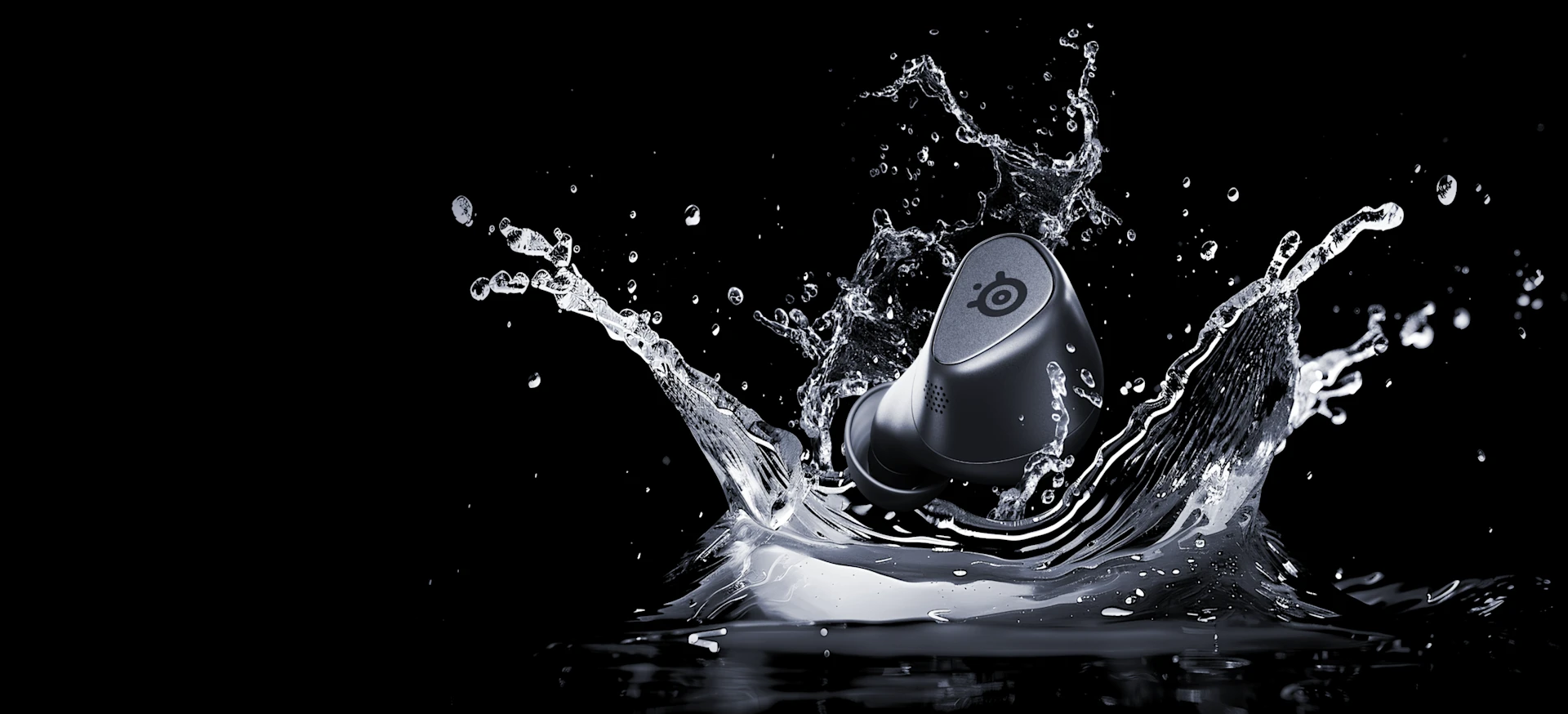 A single black Arctis Gamebuds earbud falling into the water, creating a large splash.